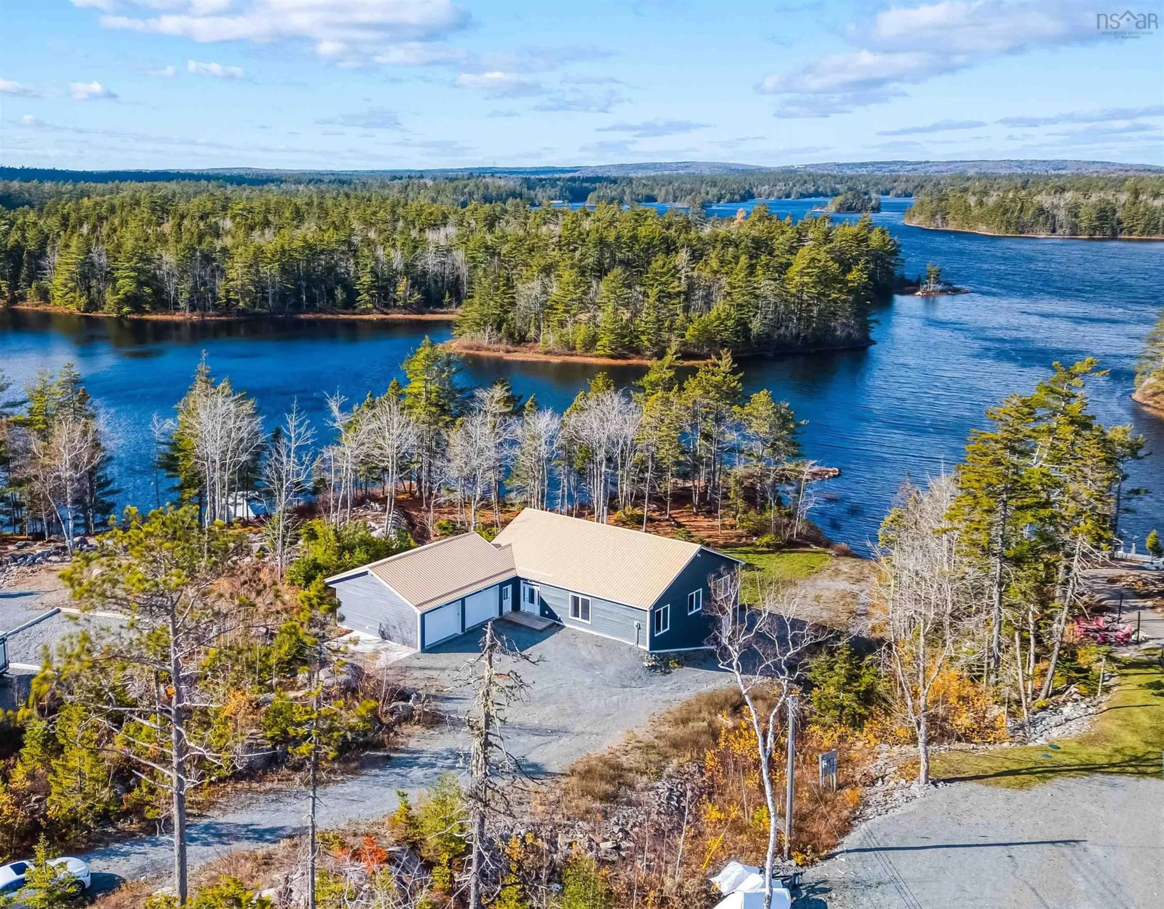 A pic from outside/outdoor area/front of a property/back of a property/a pic from drone, water/lake/river/ocean view for 256 Heritage Way #34, East Uniacke Nova Scotia B0N 1Z0