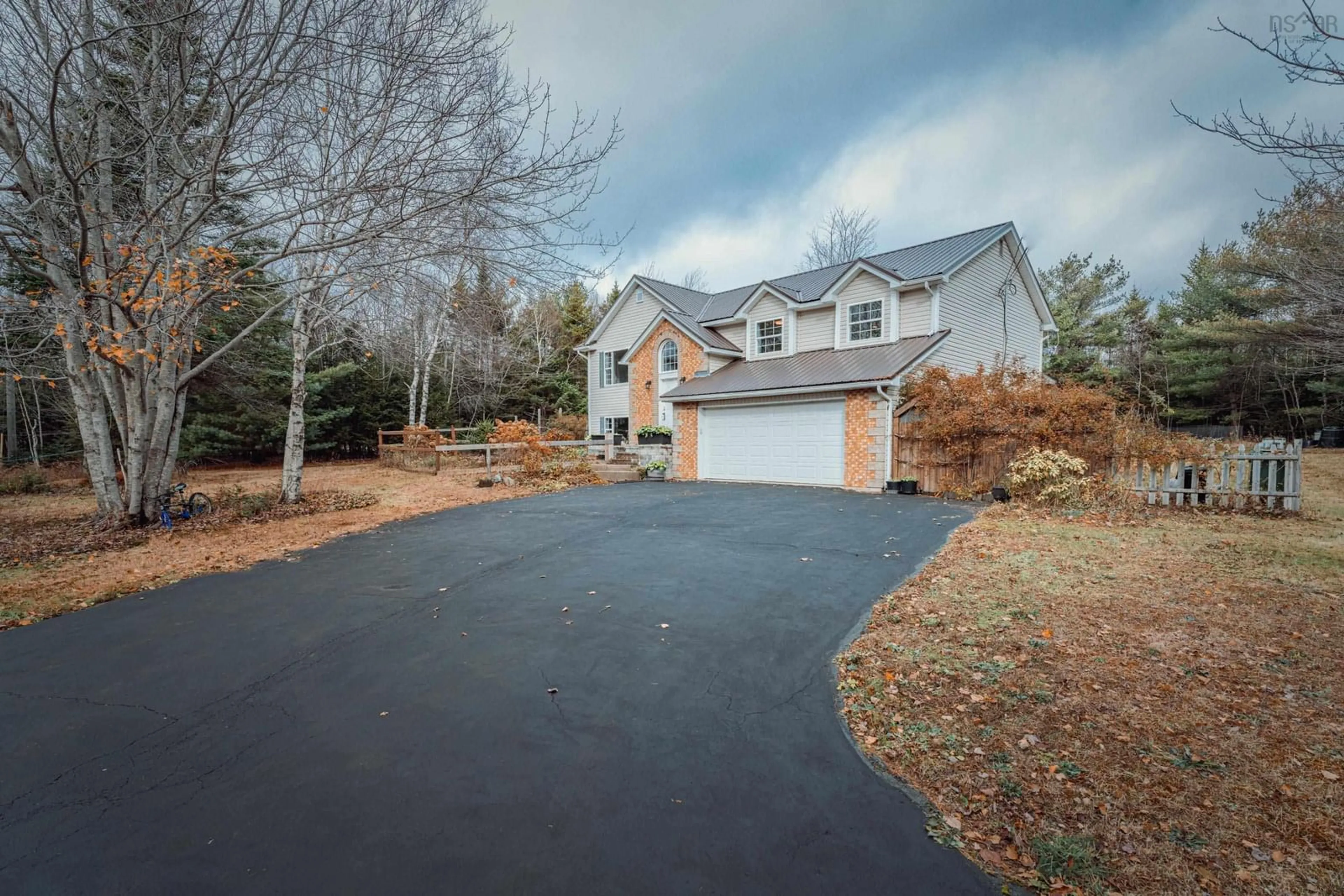 A pic from outside/outdoor area/front of a property/back of a property/a pic from drone, street for 24 Terradore Lane, Hammonds Plains Nova Scotia B4B 1S7