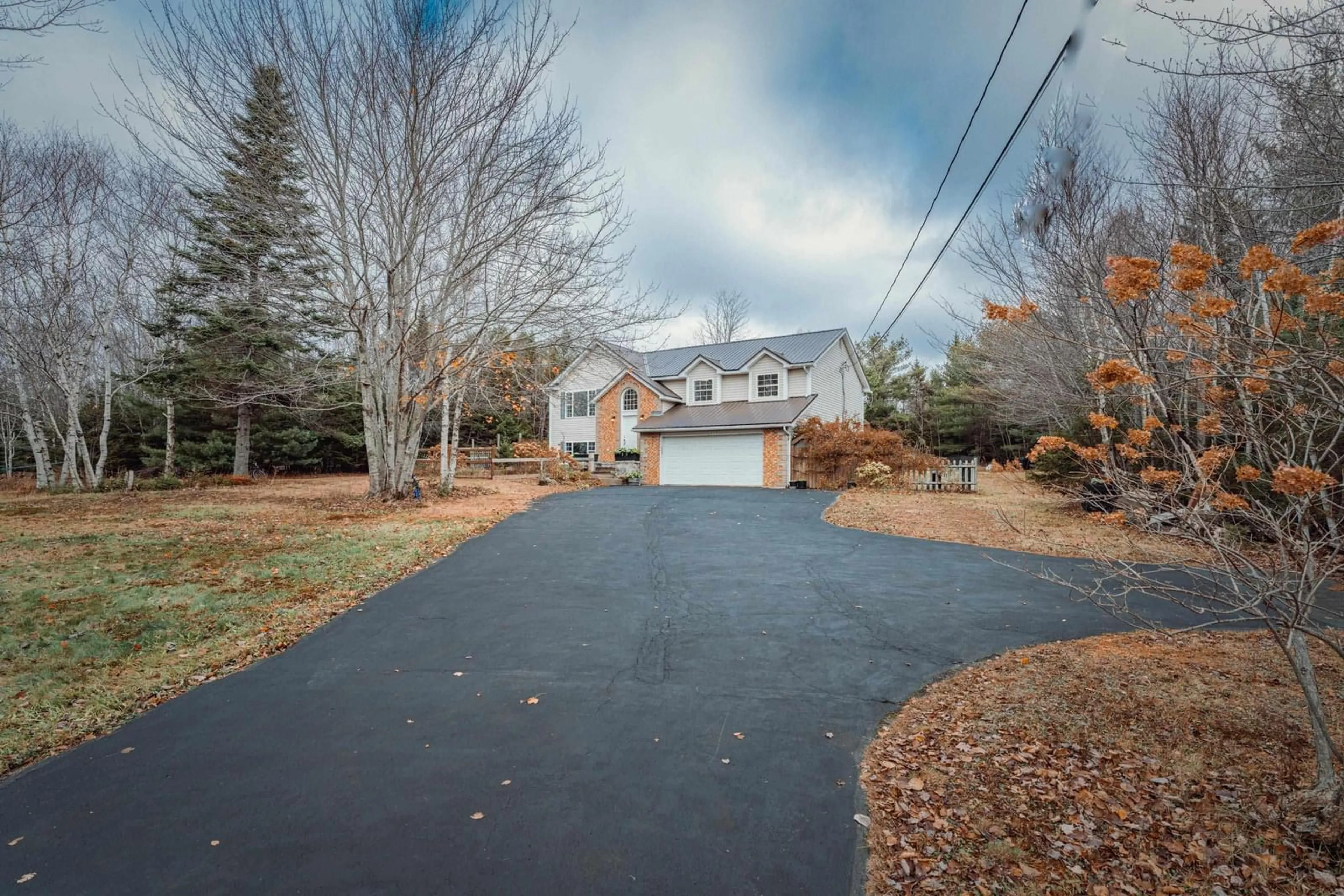 A pic from outside/outdoor area/front of a property/back of a property/a pic from drone, street for 24 Terradore Lane, Hammonds Plains Nova Scotia B4B 1S7