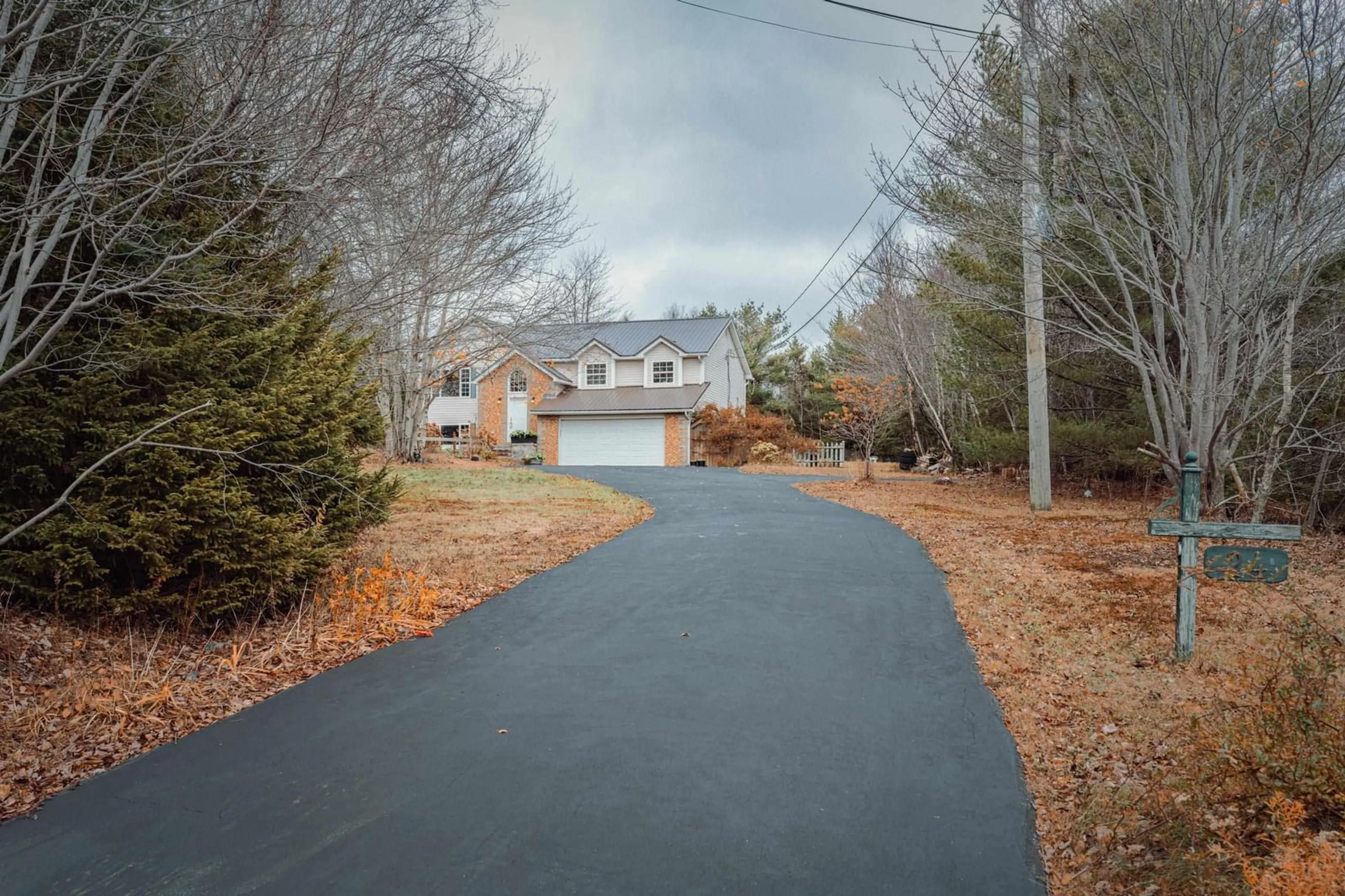 A pic from outside/outdoor area/front of a property/back of a property/a pic from drone, street for 24 Terradore Lane, Hammonds Plains Nova Scotia B4B 1S7