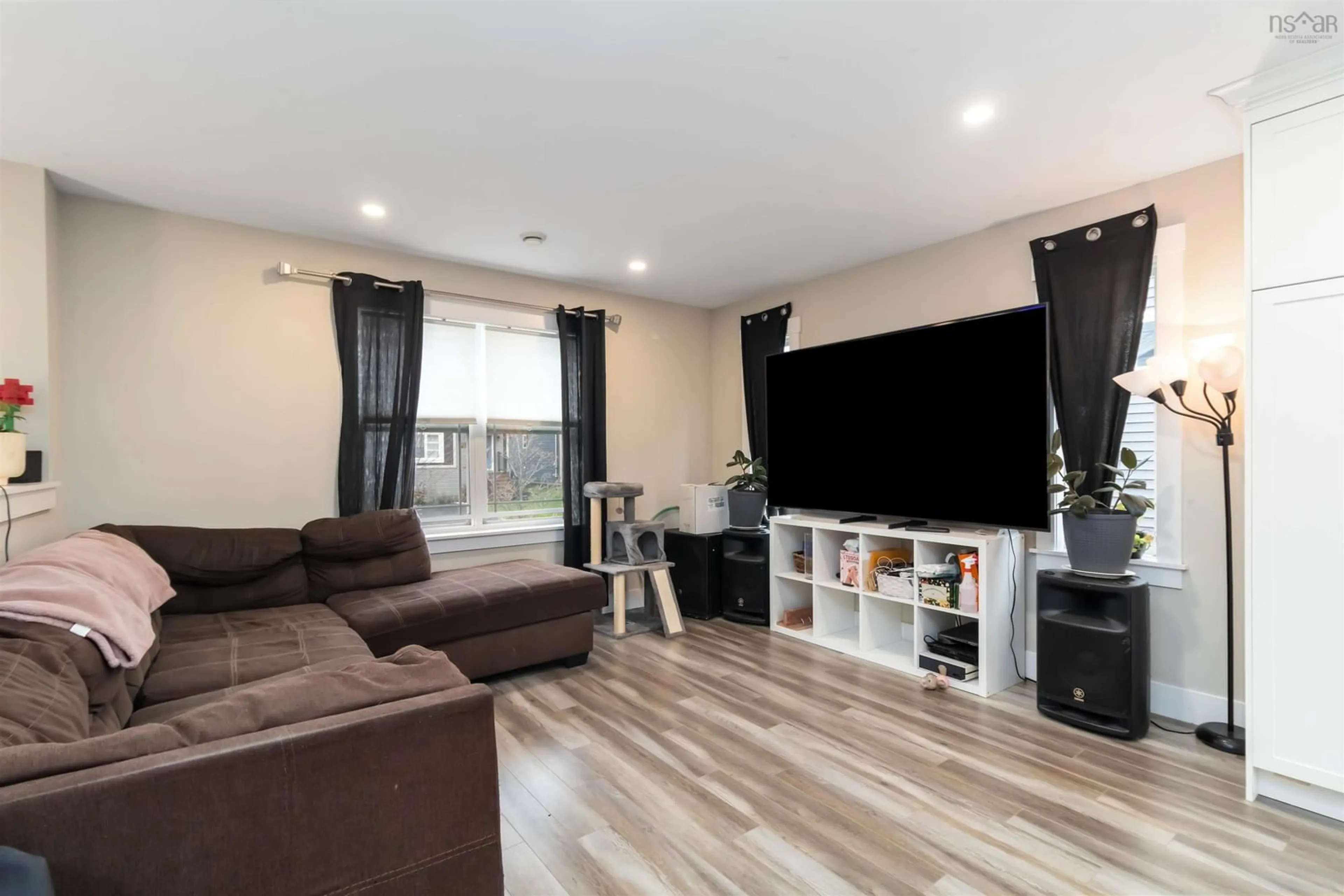 Living room with furniture, wood/laminate floor for 34 Boyne Crt, Eastern Passage Nova Scotia B3G 0H1