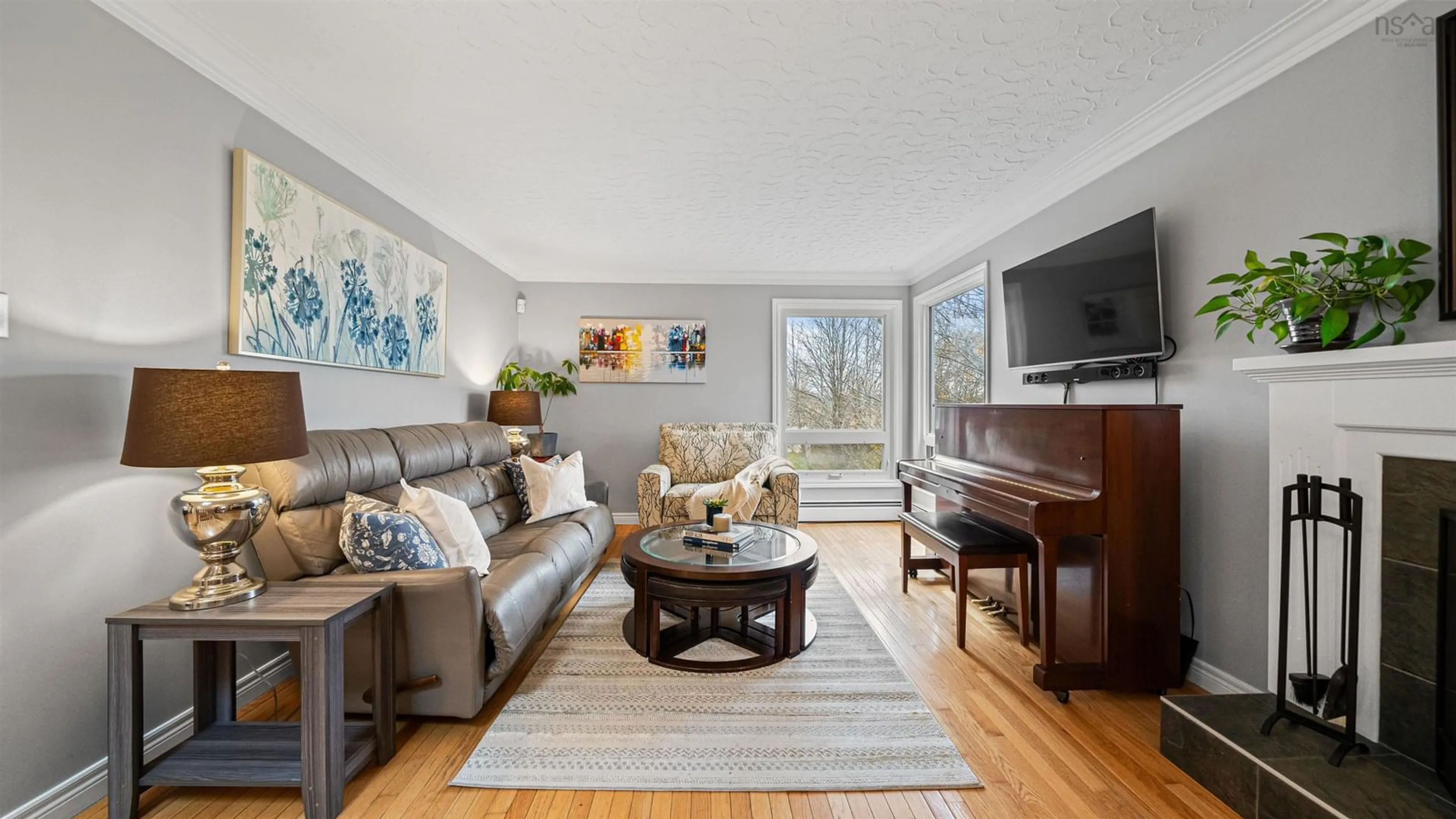 Living room with furniture, wood/laminate floor for 22A Towerview, Fleming Heights Nova Scotia B3P 1E9