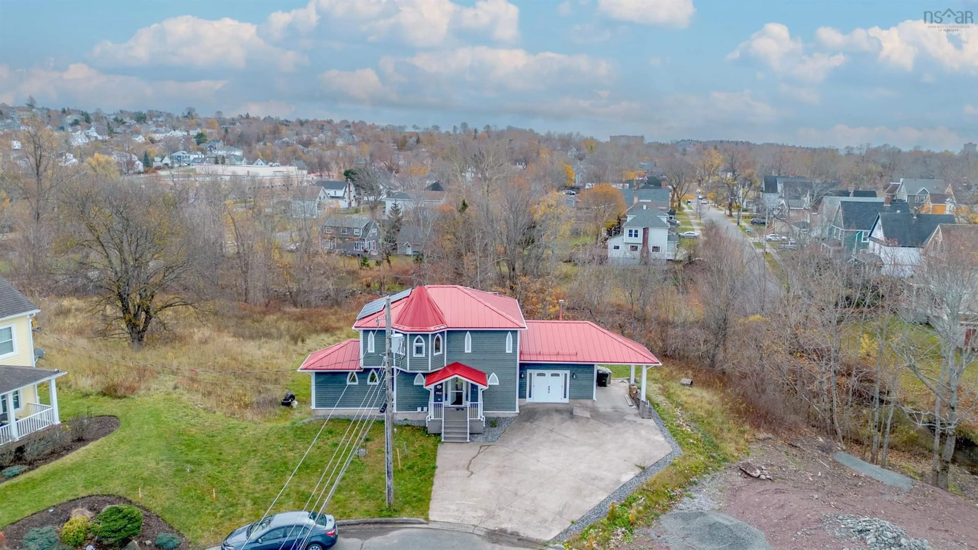 A pic from outside/outdoor area/front of a property/back of a property/a pic from drone, unknown for 15 Howe Crt, Sydney Nova Scotia B1P 0B2