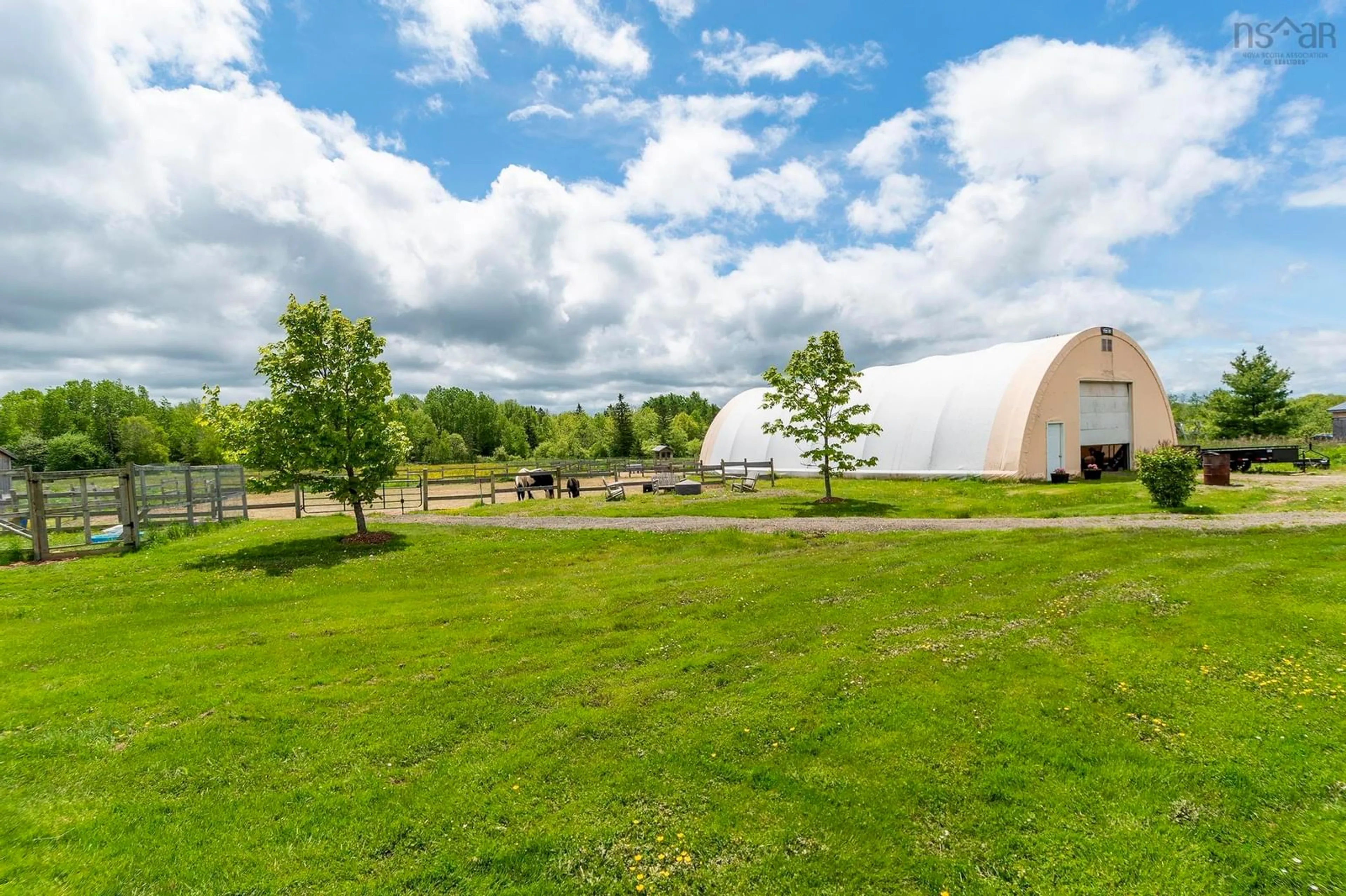A pic from outside/outdoor area/front of a property/back of a property/a pic from drone, unknown for 10928 Highway 1, Paradise Nova Scotia B0S 1M0