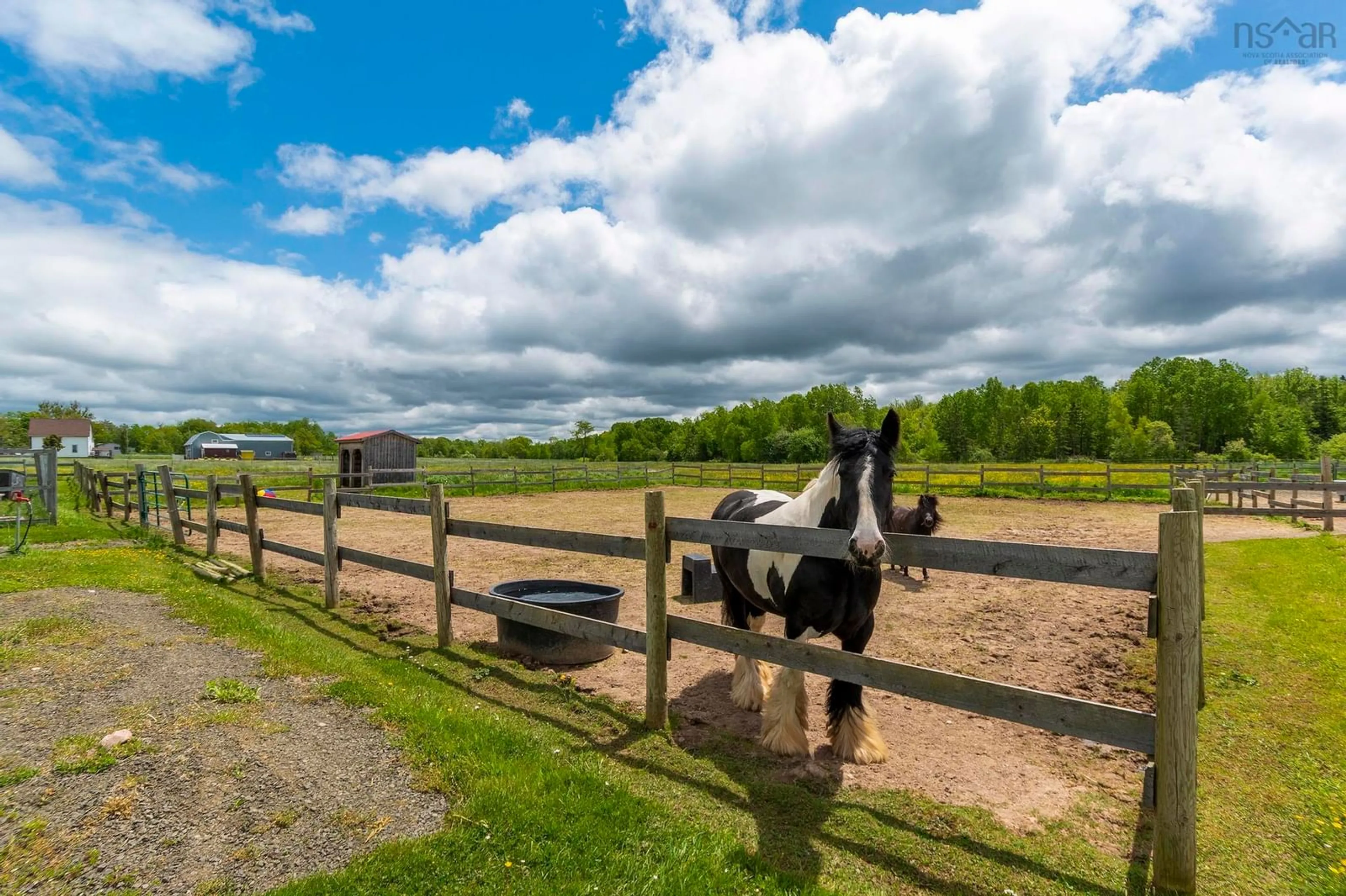 A pic from outside/outdoor area/front of a property/back of a property/a pic from drone, unknown for 10928 Highway 1, Paradise Nova Scotia B0S 1M0
