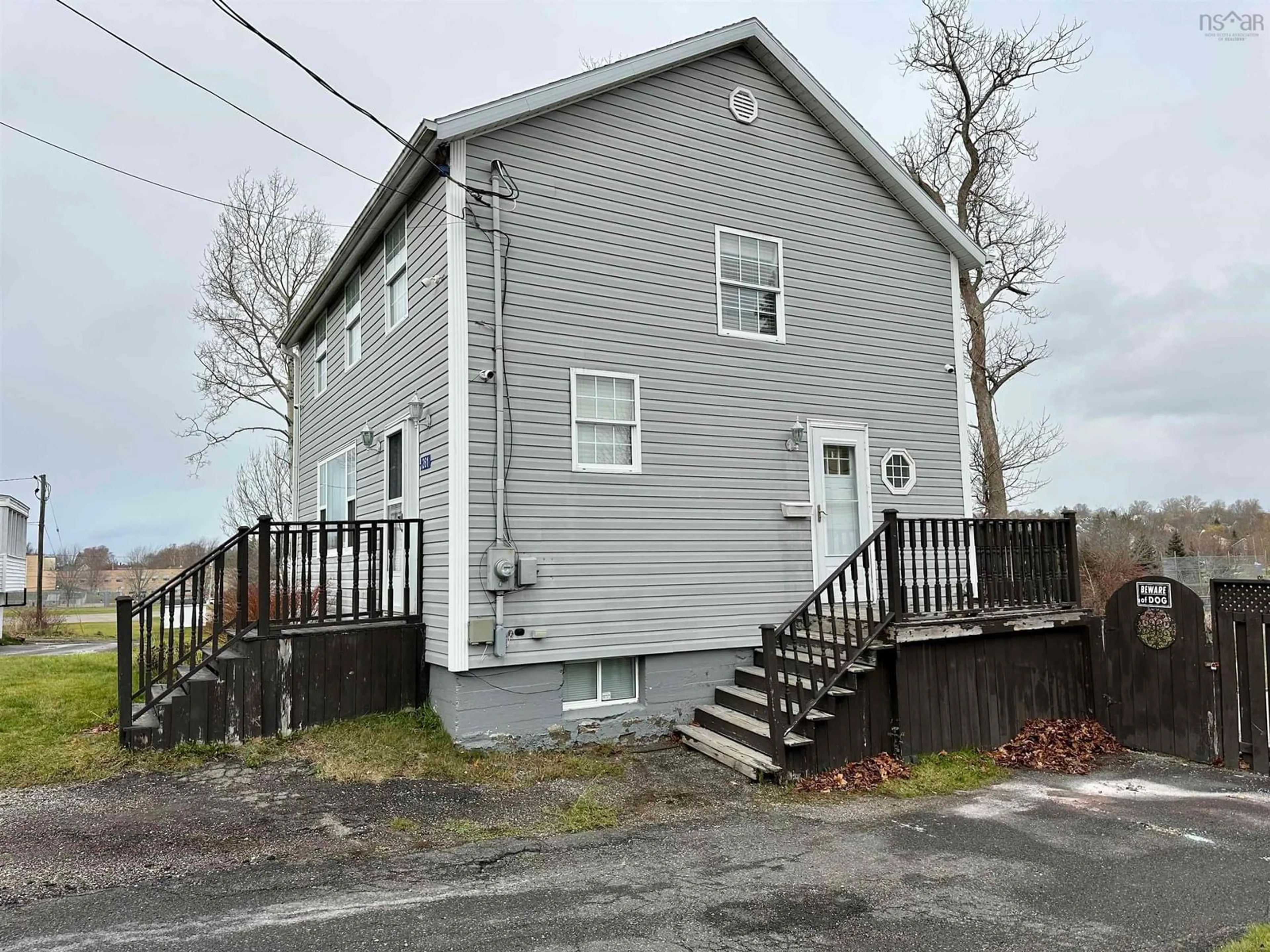 A pic from outside/outdoor area/front of a property/back of a property/a pic from drone, building for 261 Cottage Rd, Sydney Nova Scotia B1P 2E7