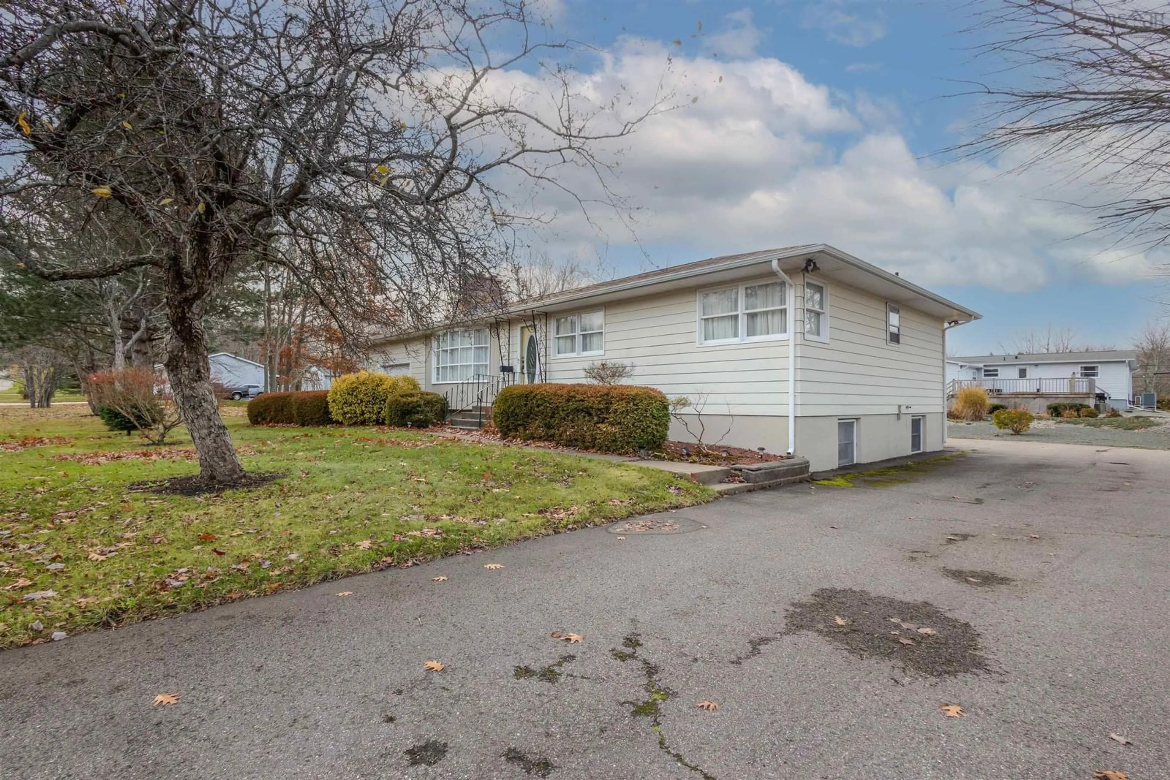 Home with vinyl exterior material, street for 12 Birchdale Dr, Sydney River Nova Scotia B1S 1L5