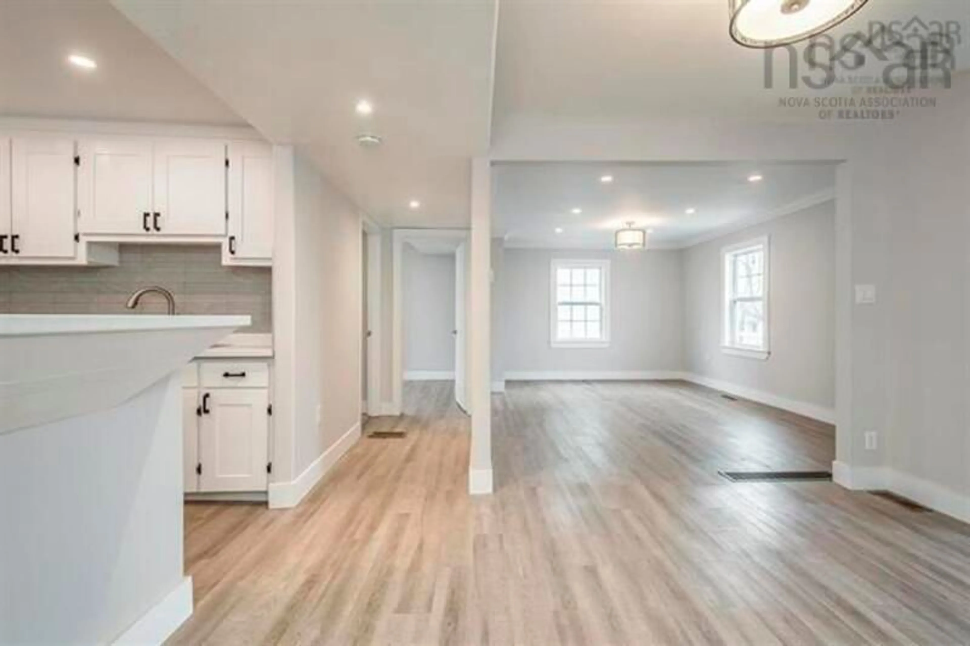 Open concept kitchen, wood/laminate floor for 82 Albro Lake Rd, Dartmouth Nova Scotia B3A 3Y5