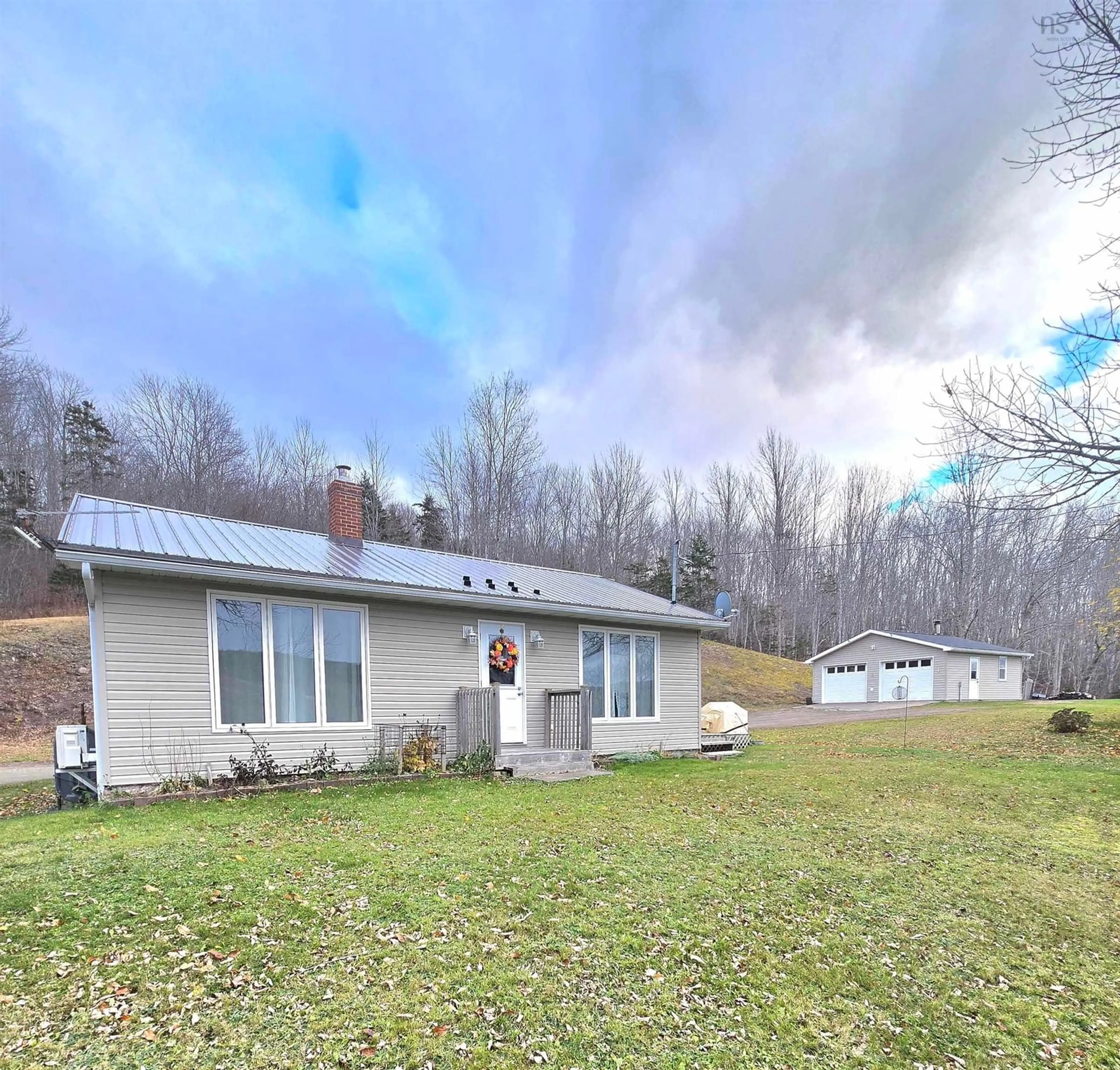 A pic from outside/outdoor area/front of a property/back of a property/a pic from drone, unknown for 926 Highway 7, Lochaber Nova Scotia B2G 2L3