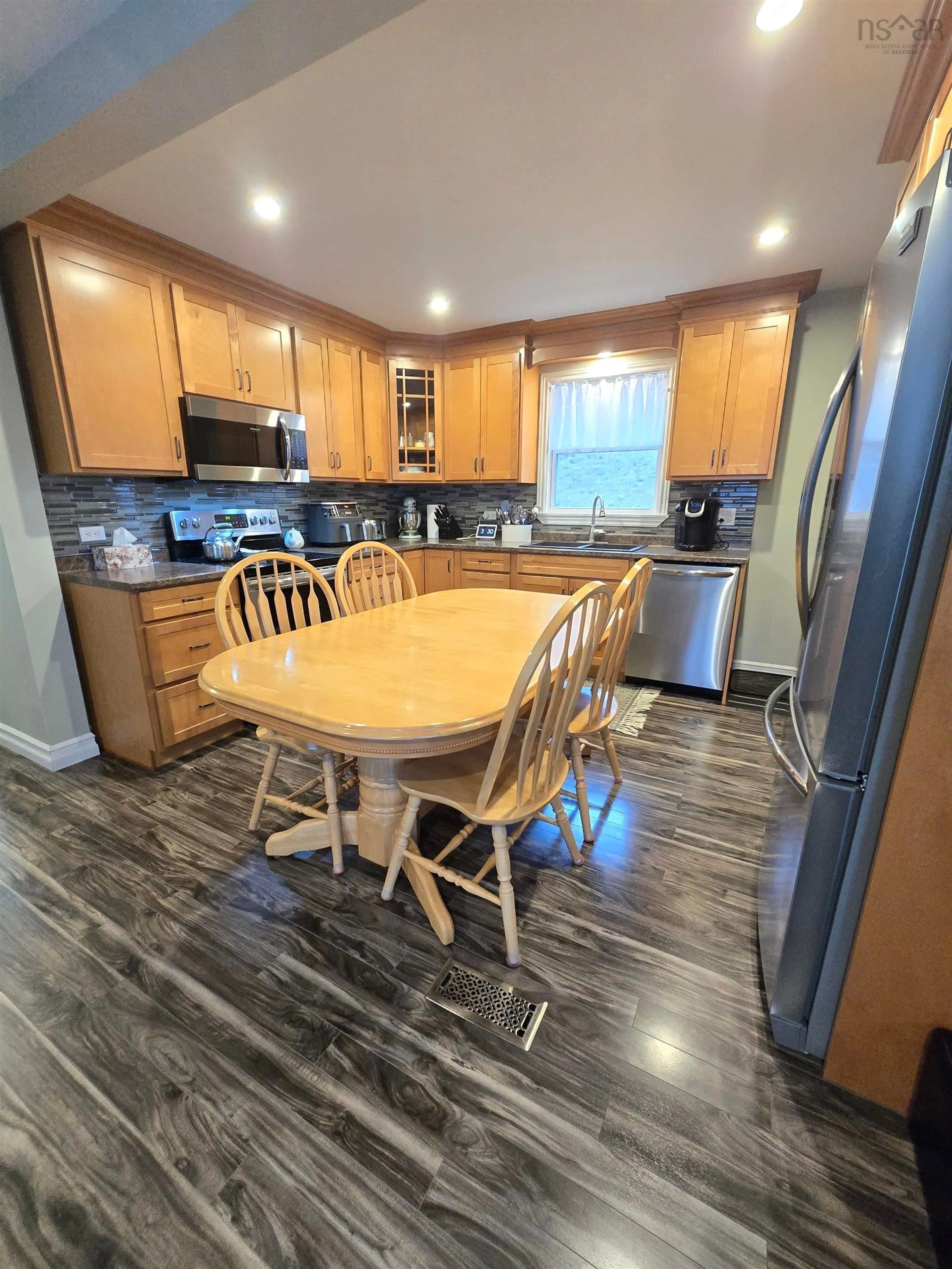 Open concept kitchen, wood/laminate floor for 926 Highway 7, Lochaber Nova Scotia B2G 2L3