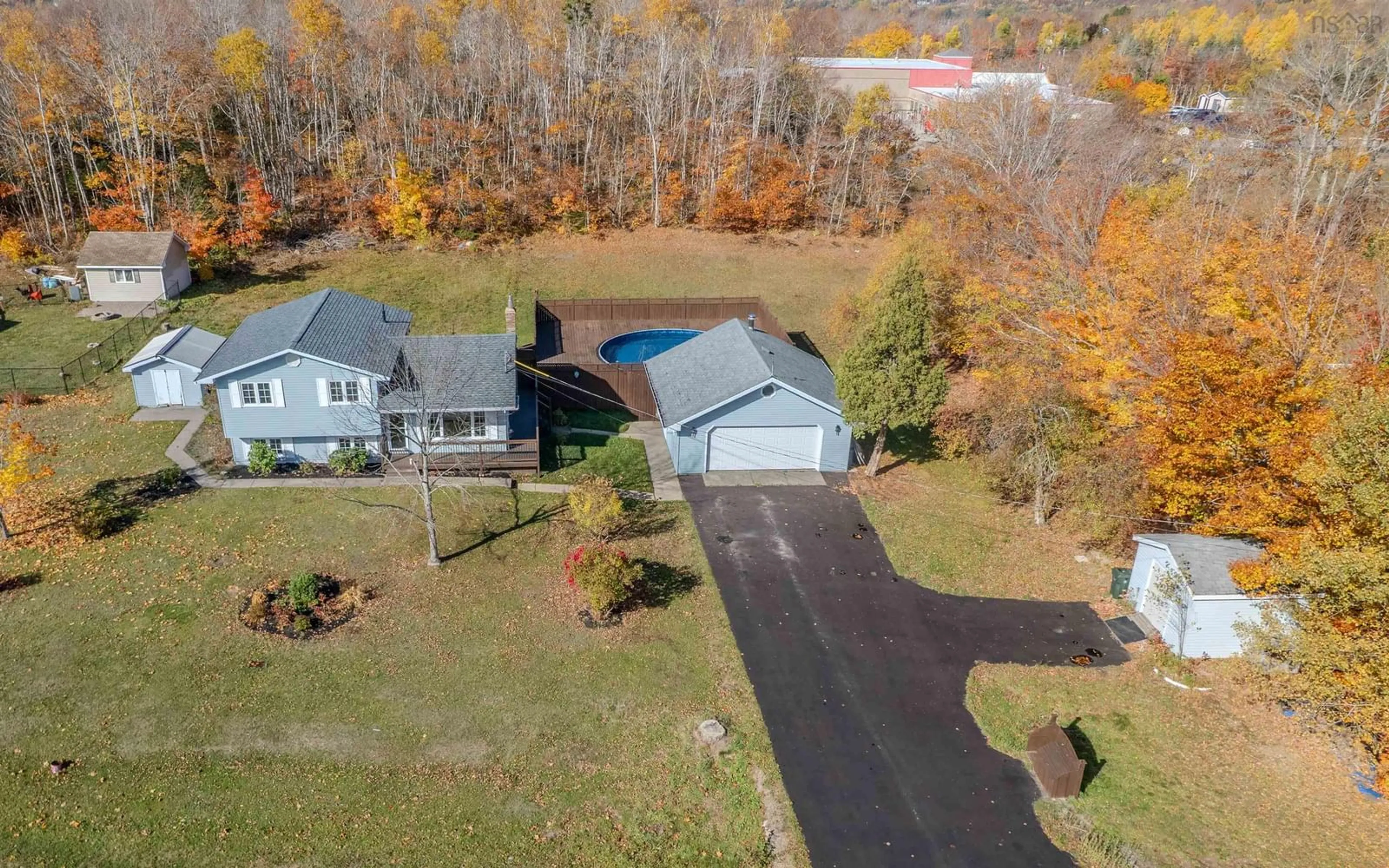 A pic from outside/outdoor area/front of a property/back of a property/a pic from drone, unknown for 22 Oakland Dr, Howie Centre Nova Scotia B1L 1H1