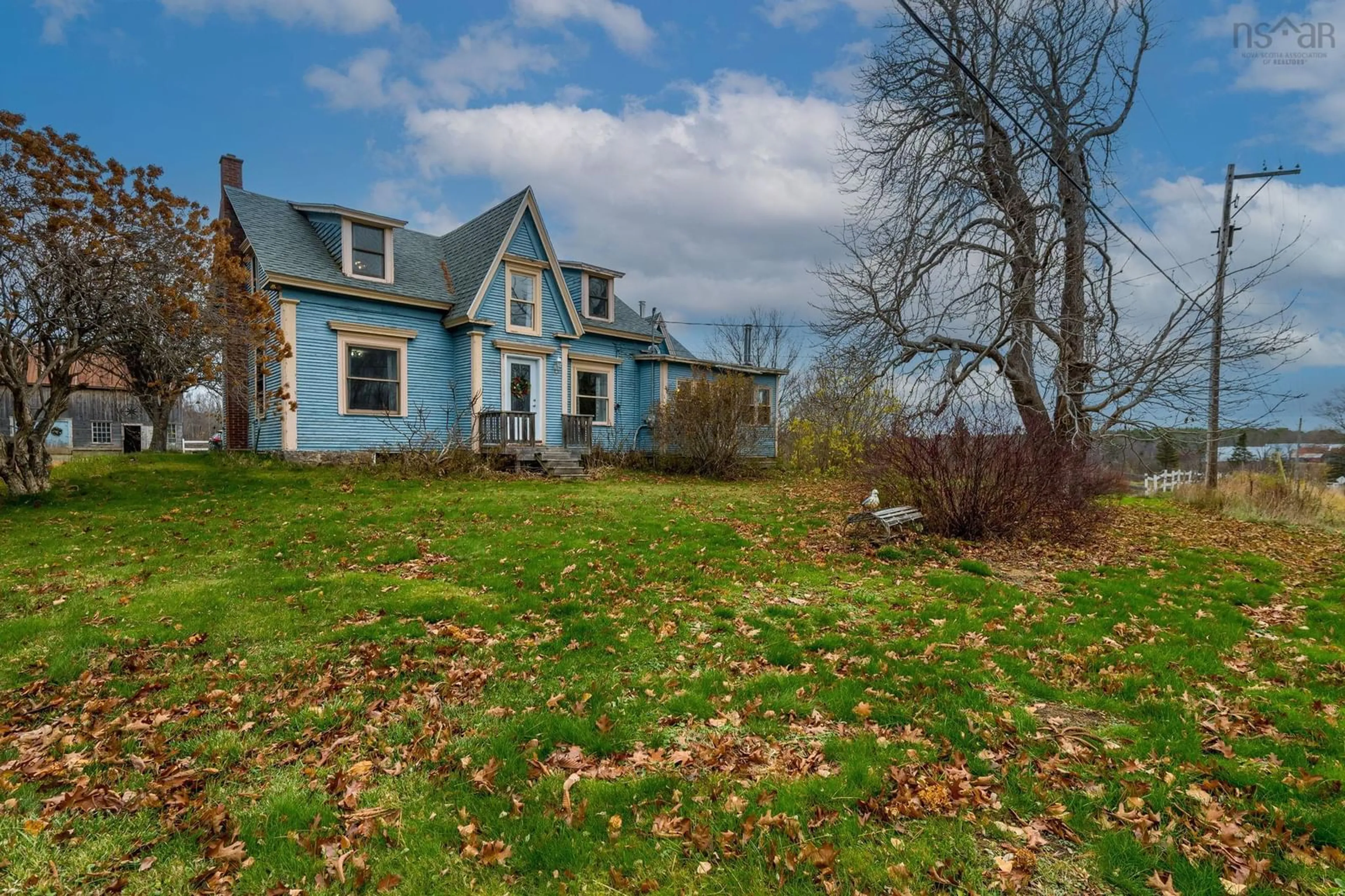 A pic from outside/outdoor area/front of a property/back of a property/a pic from drone, unknown for 9991 Highway 1, Paradise Nova Scotia B0S 1C0