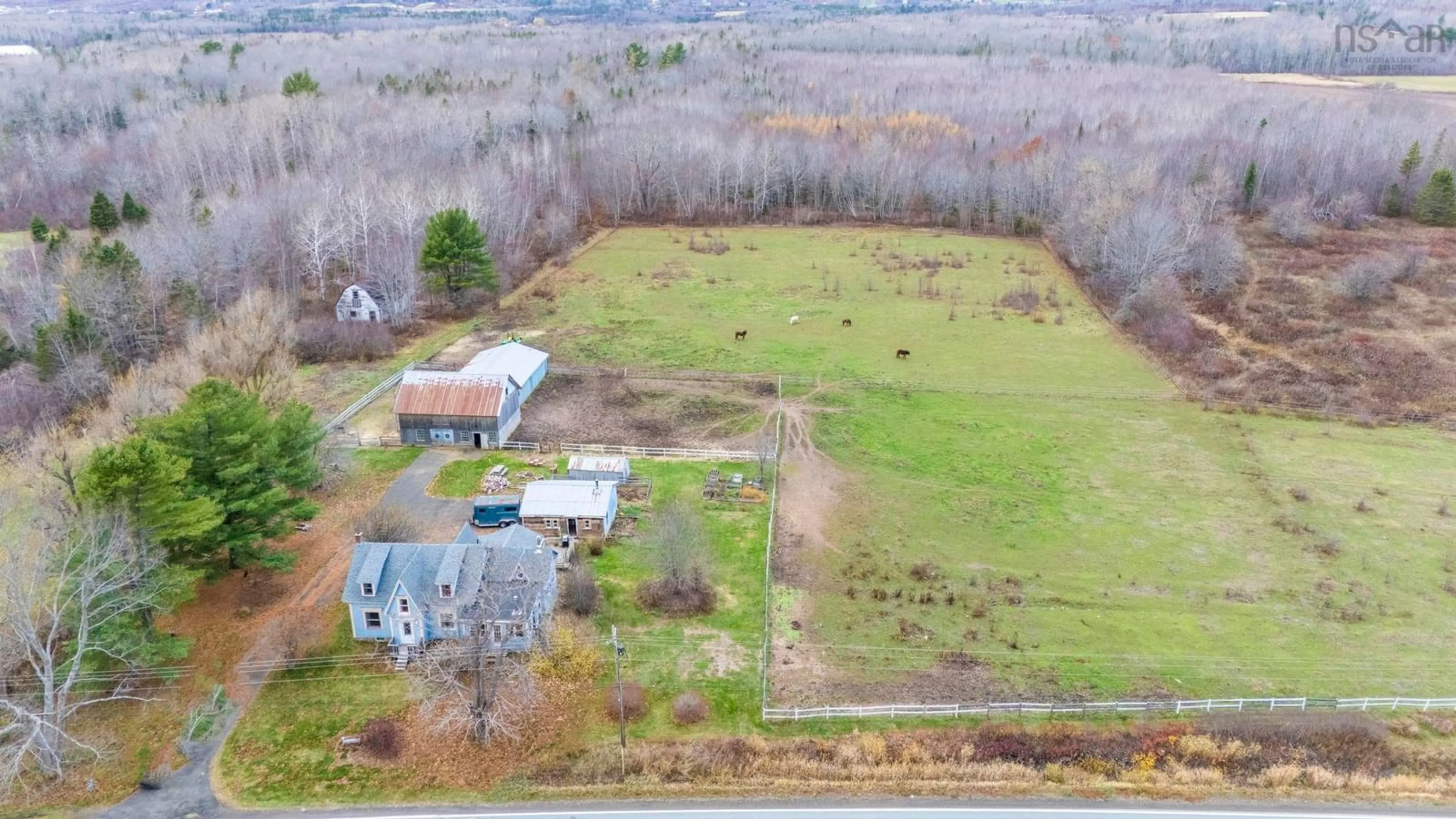 A pic from outside/outdoor area/front of a property/back of a property/a pic from drone, building for 9991 Highway 1, Paradise Nova Scotia B0S 1C0
