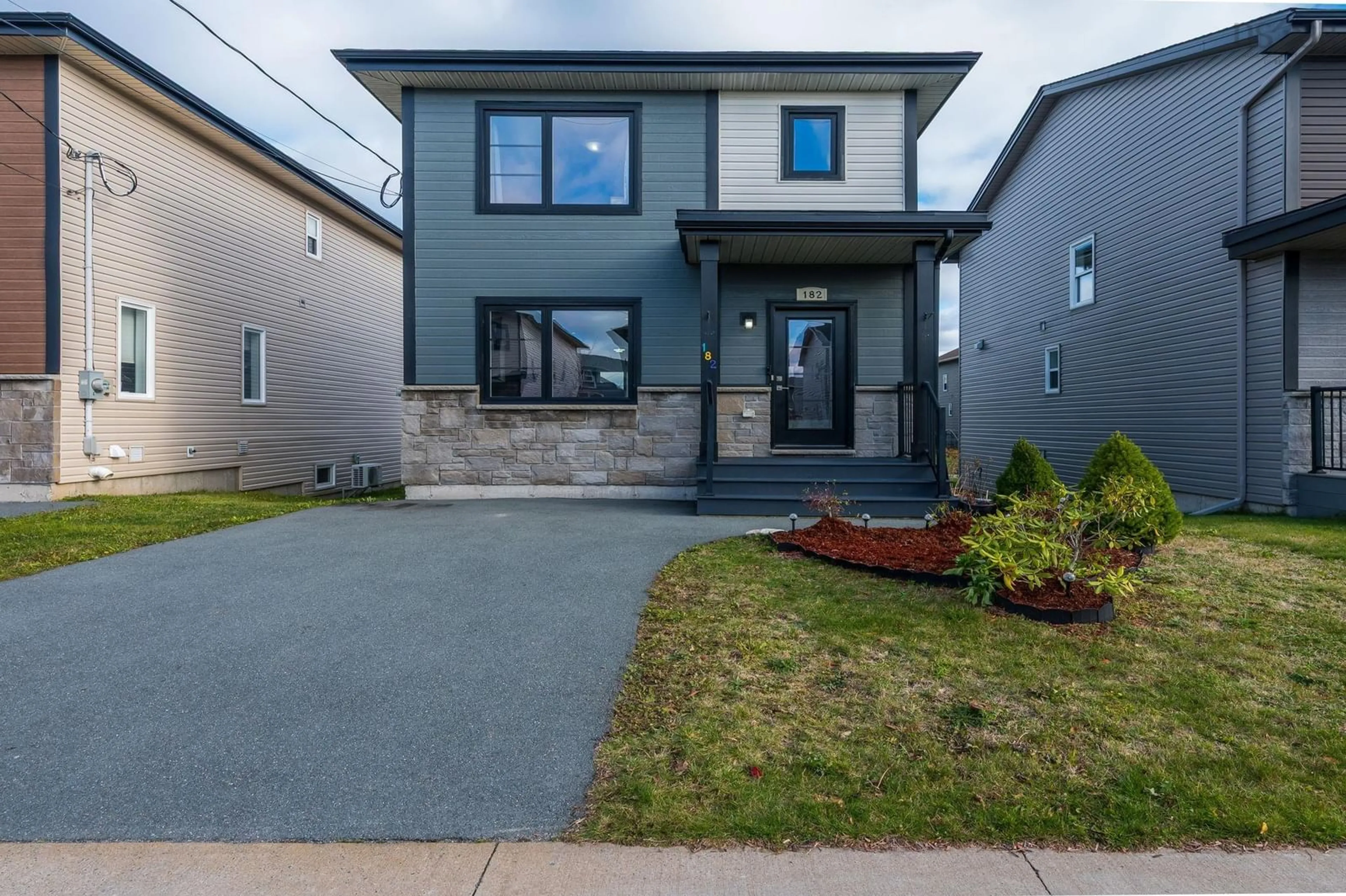 Home with brick exterior material, street for 182 Titanium Cres, Halifax Nova Scotia B3P 0J2