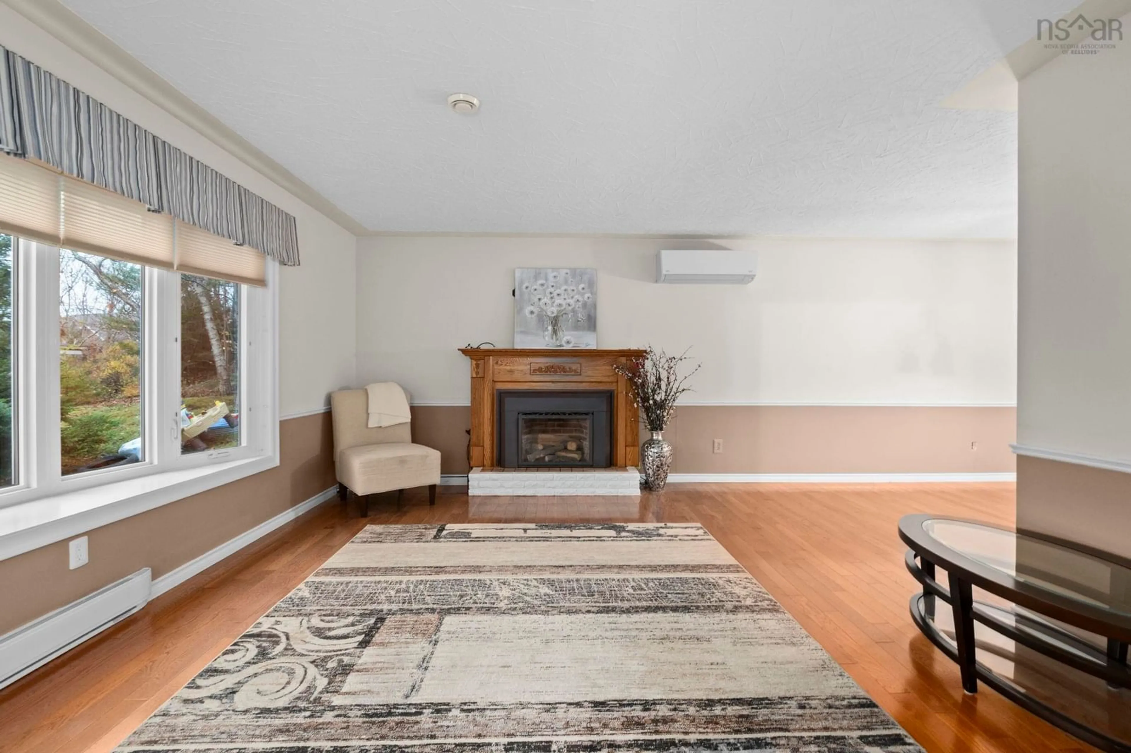 Living room with furniture, wood/laminate floor for 10 Plymouth St, Halifax Nova Scotia B3M 2S2