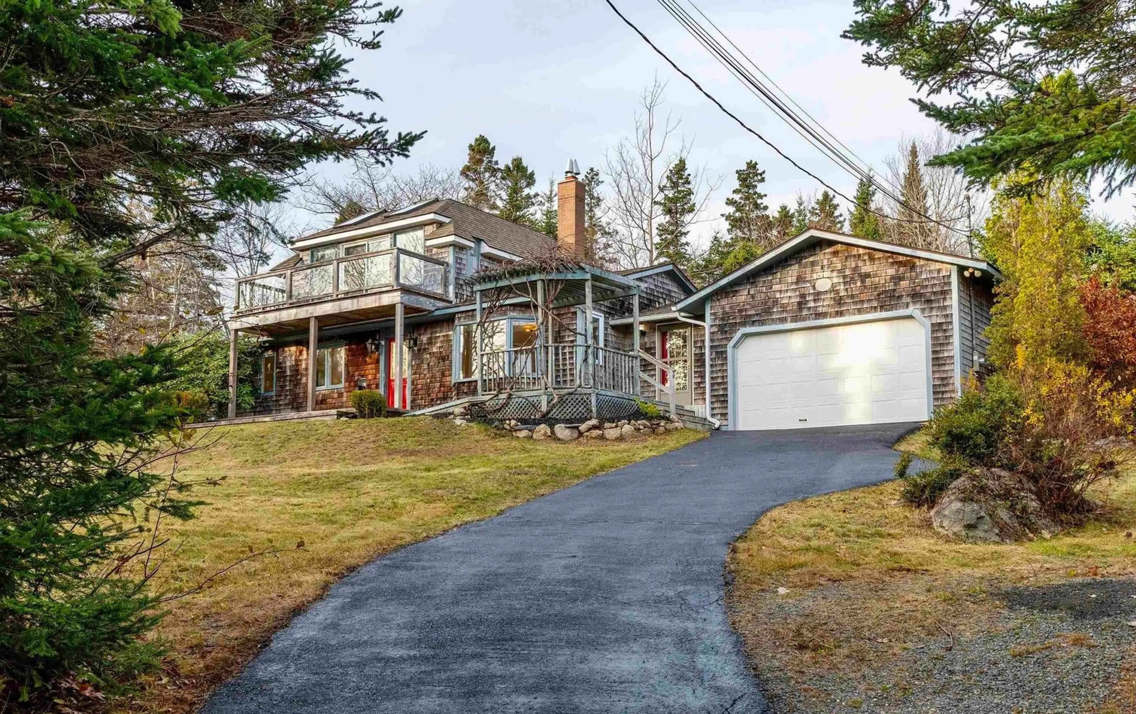 A pic from outside/outdoor area/front of a property/back of a property/a pic from drone, street for 310 Hillside Dr, Boutiliers Point Nova Scotia B3Z 1W8