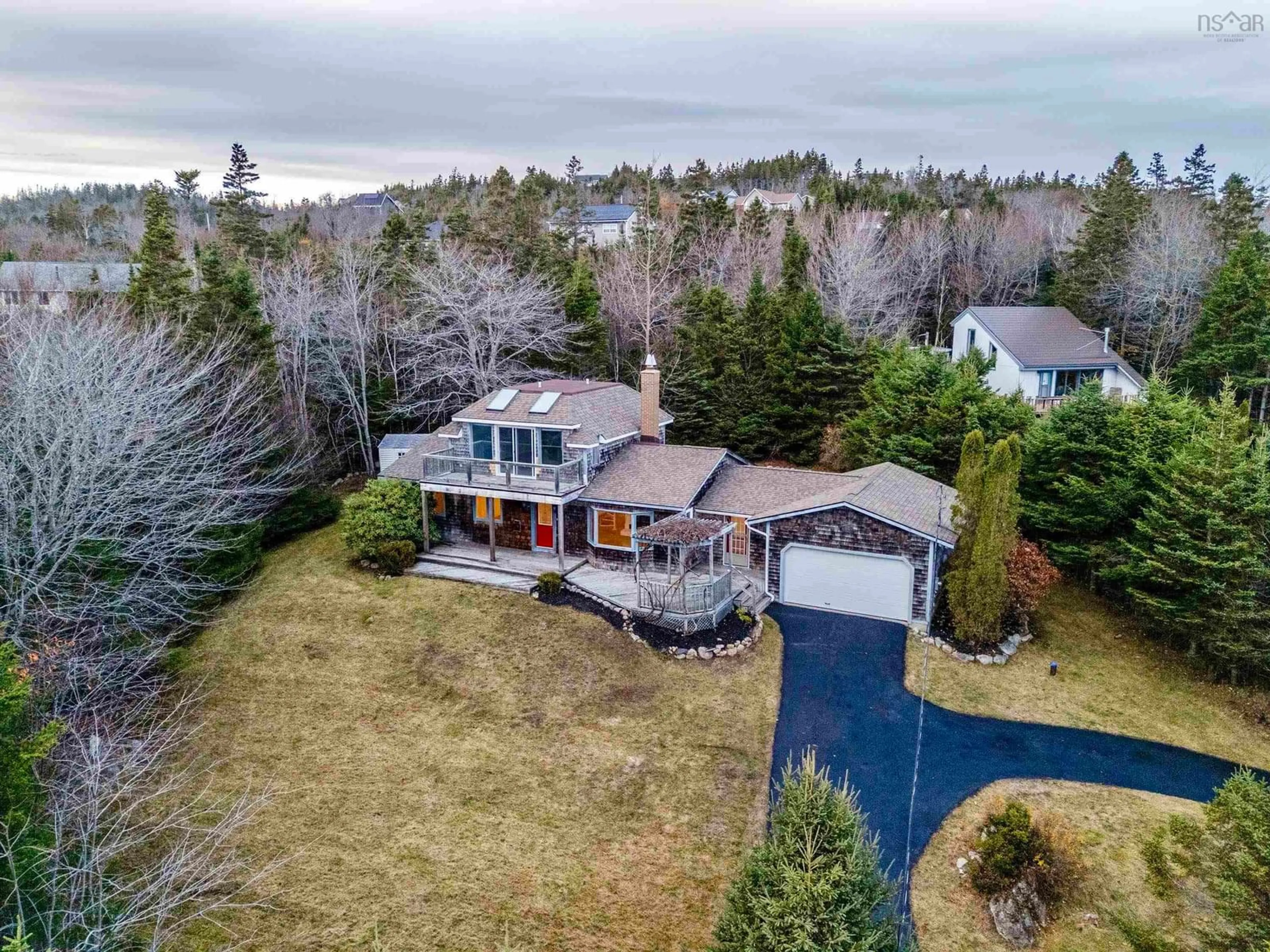 A pic from outside/outdoor area/front of a property/back of a property/a pic from drone, water/lake/river/ocean view for 310 Hillside Dr, Boutiliers Point Nova Scotia B3Z 1W8