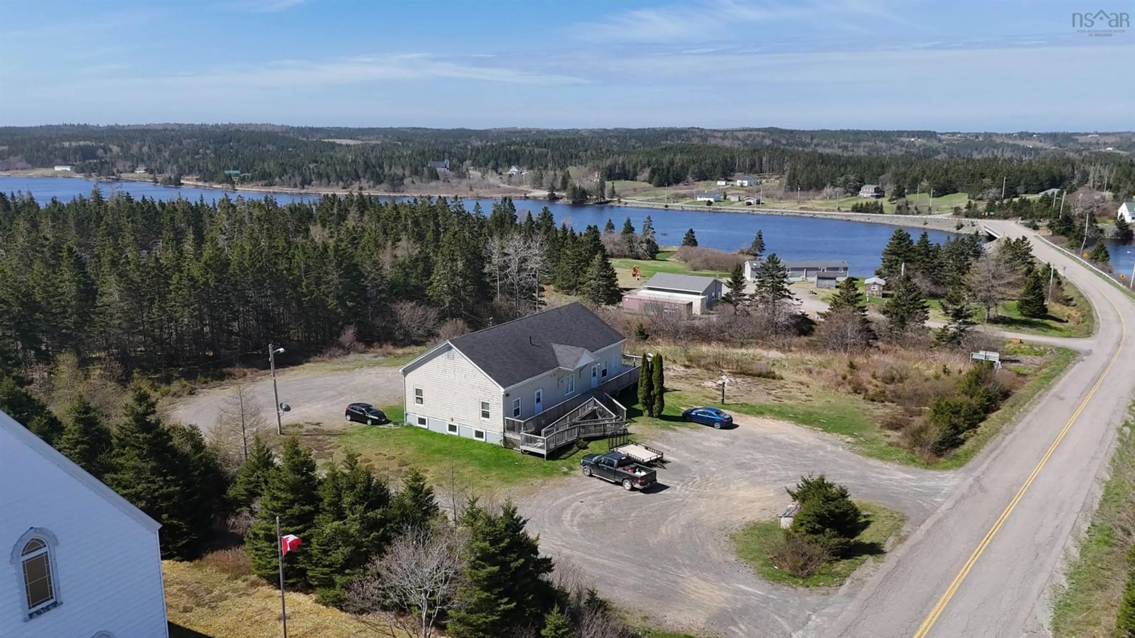 A pic from outside/outdoor area/front of a property/back of a property/a pic from drone, water/lake/river/ocean view for 1826 St Peters Fourchu Rd, Grand River Nova Scotia B0E 1M0