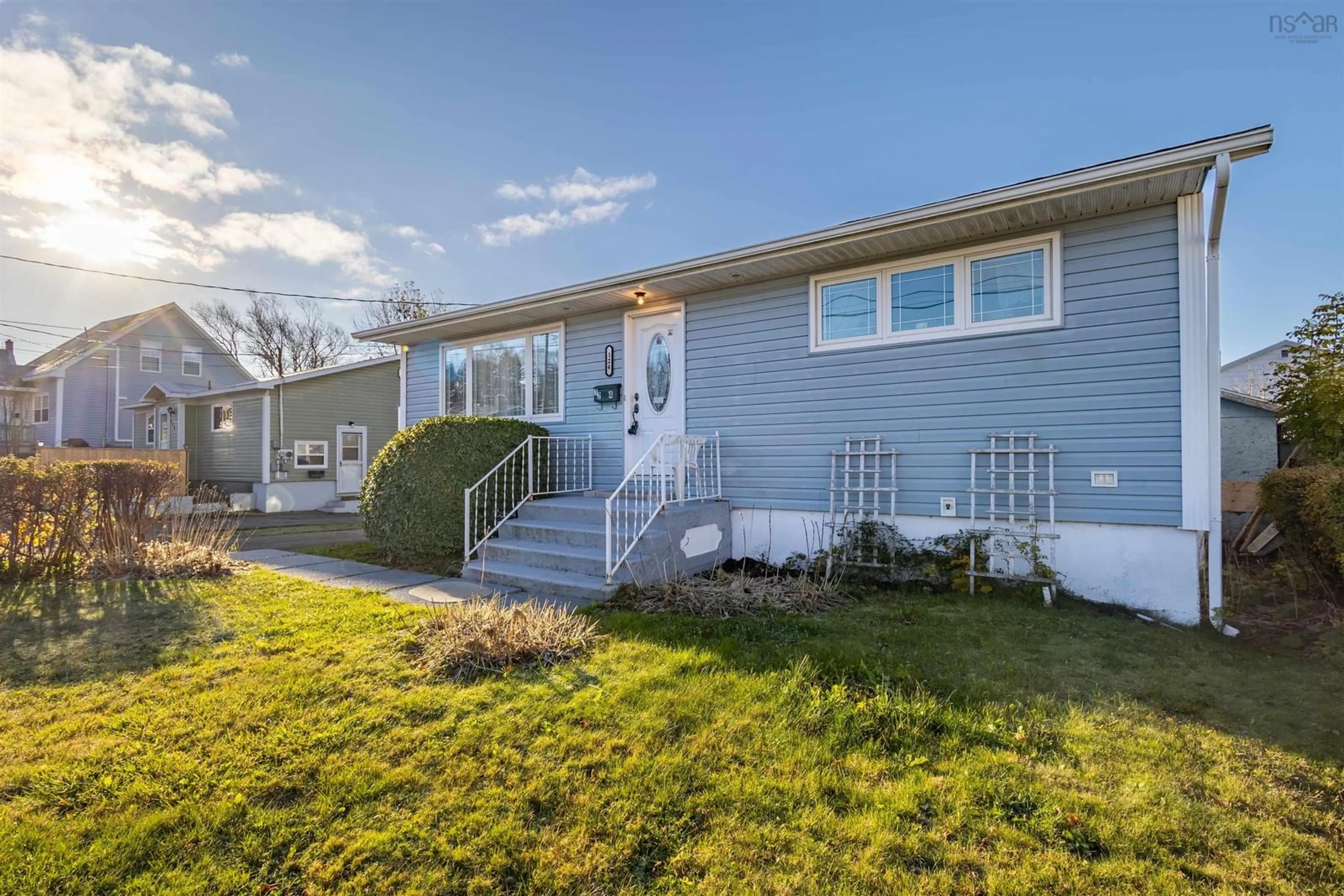 Home with vinyl exterior material, street for 124 Legacy St, Sydney Nova Scotia B1P 2X8