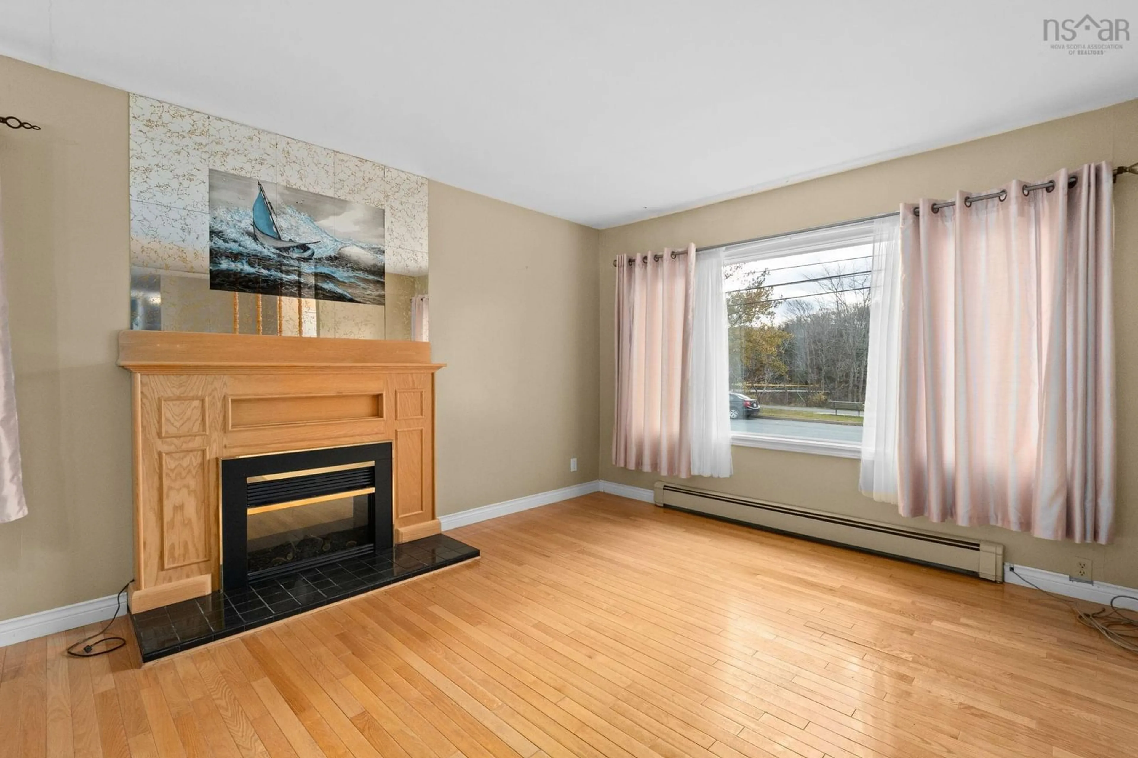 Living room with furniture, wood/laminate floor for 47 Penhorn Dr, Dartmouth Nova Scotia B2Y 3K4