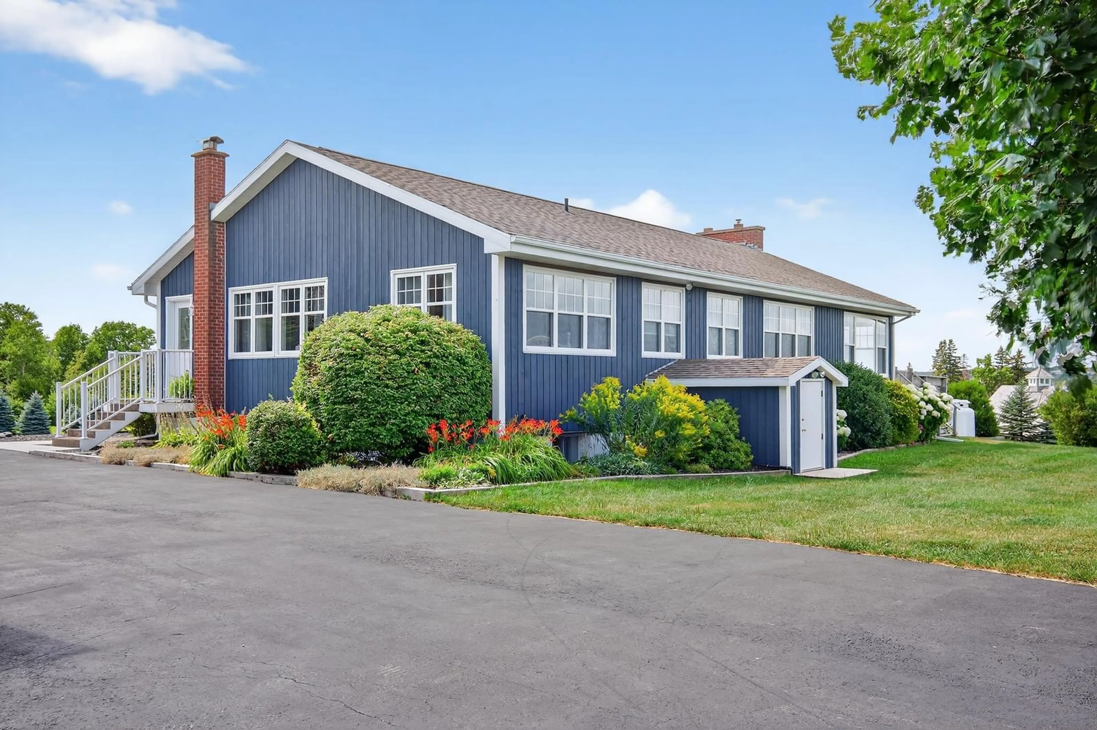 Home with vinyl exterior material, street for 2140 Point Edward Highway, Point Edward Nova Scotia B2A 4R6