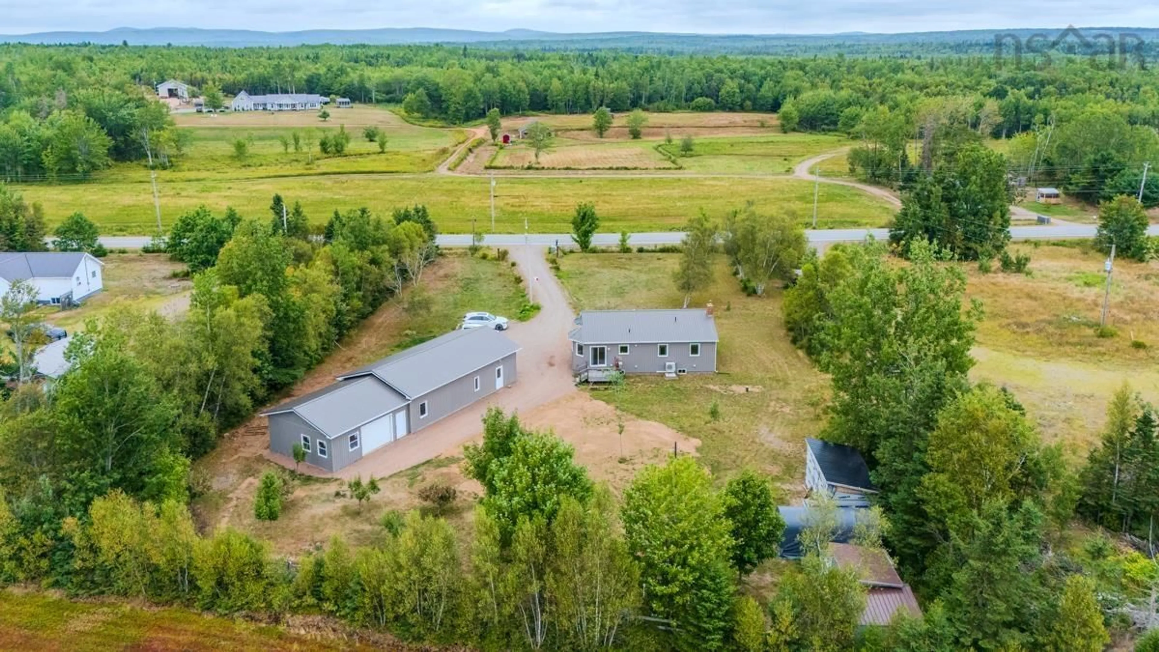 A pic from outside/outdoor area/front of a property/back of a property/a pic from drone, unknown for 7048 Hwy 2, Portapique Nova Scotia B0M 1B0