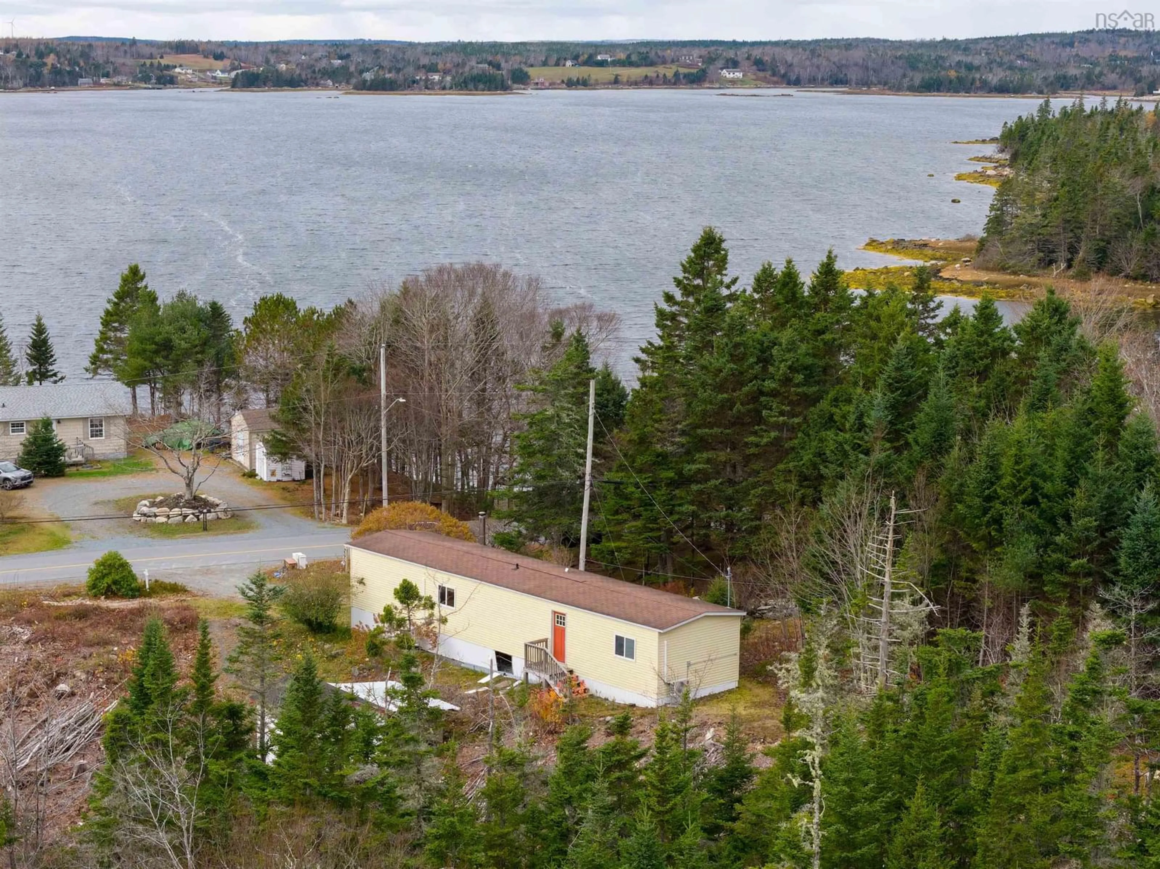 A pic from outside/outdoor area/front of a property/back of a property/a pic from drone, water/lake/river/ocean view for 219 Myers Point Rd, Jeddore Nova Scotia B0J 1P0