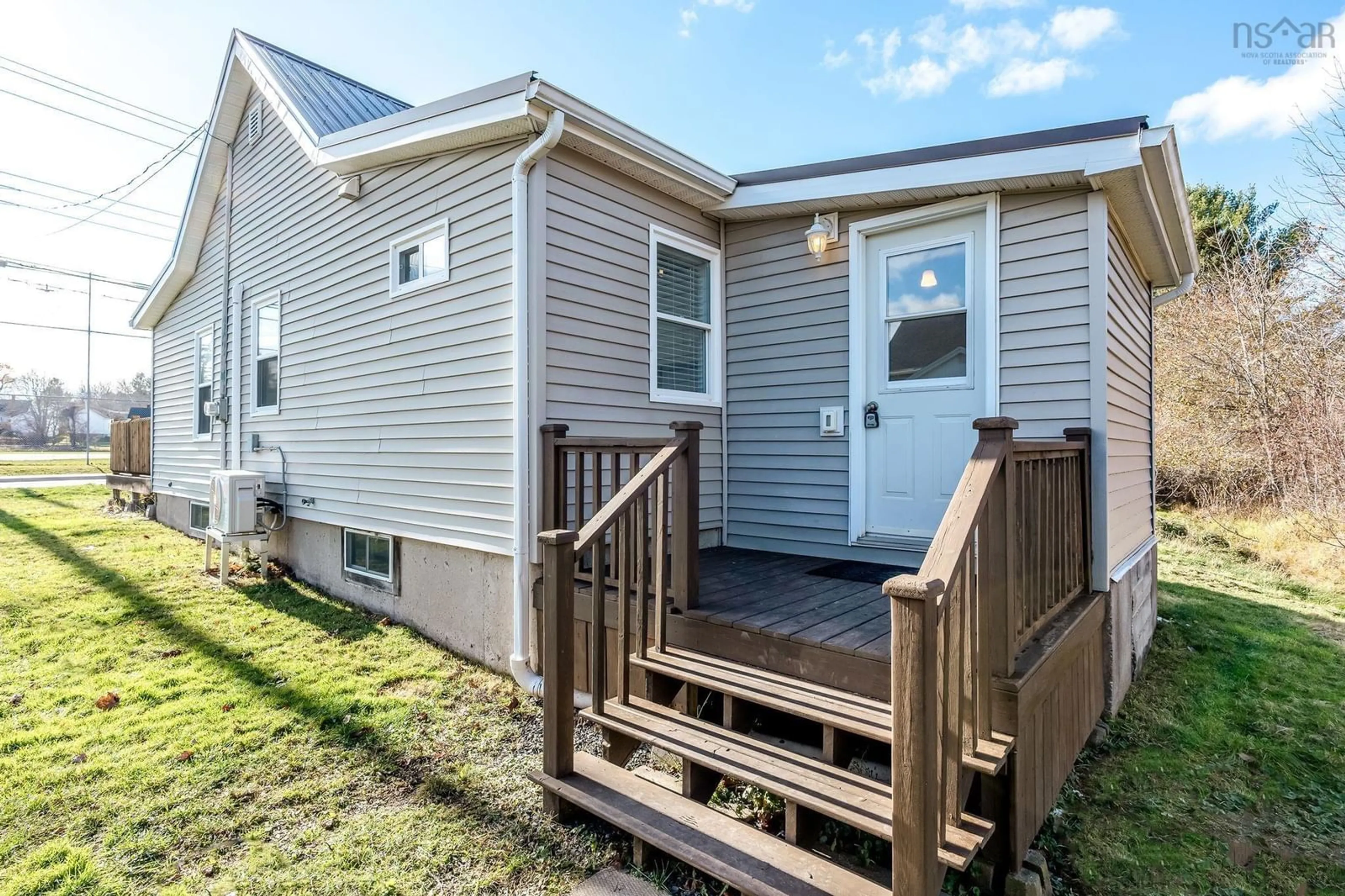 Home with vinyl exterior material, street for 18 School St, Hantsport Nova Scotia B0P 1P0