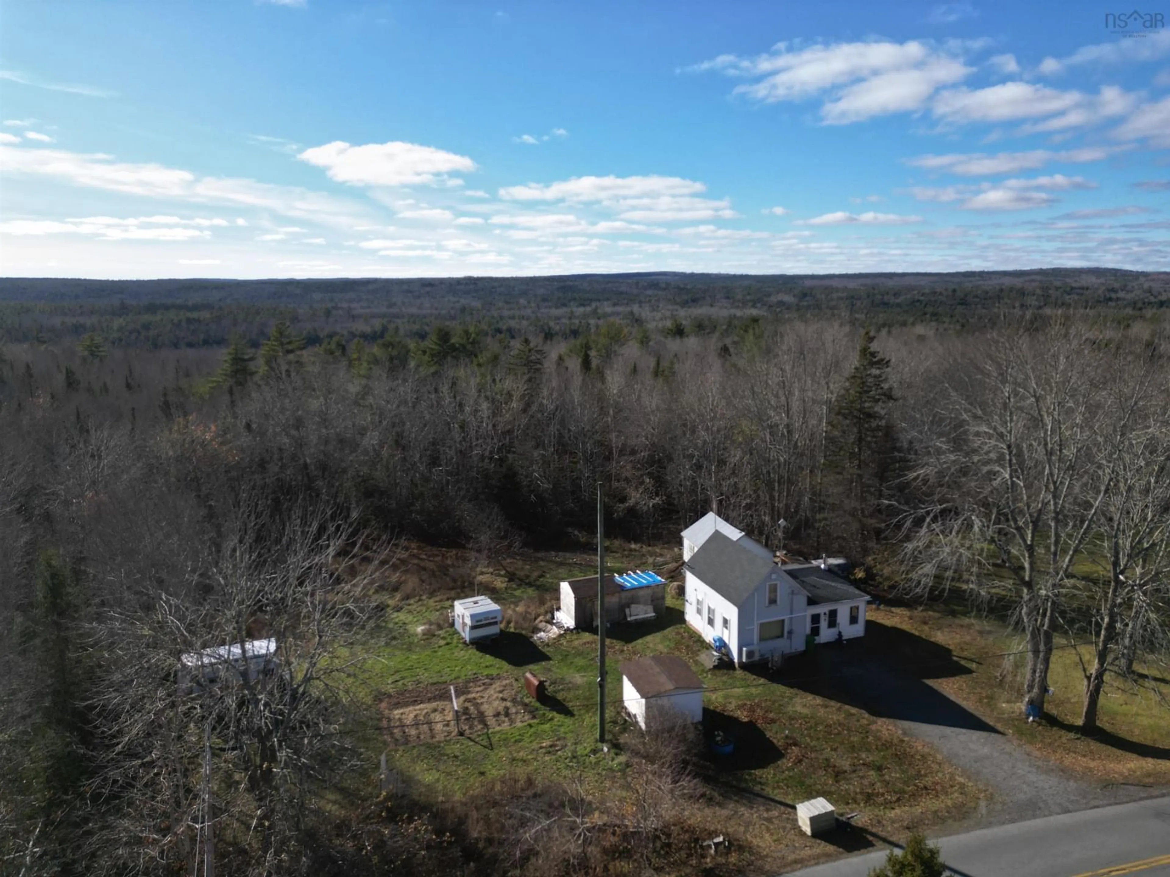 A pic from outside/outdoor area/front of a property/back of a property/a pic from drone, unknown for 1171 North River Rd, North River Nova Scotia B0R 1E0