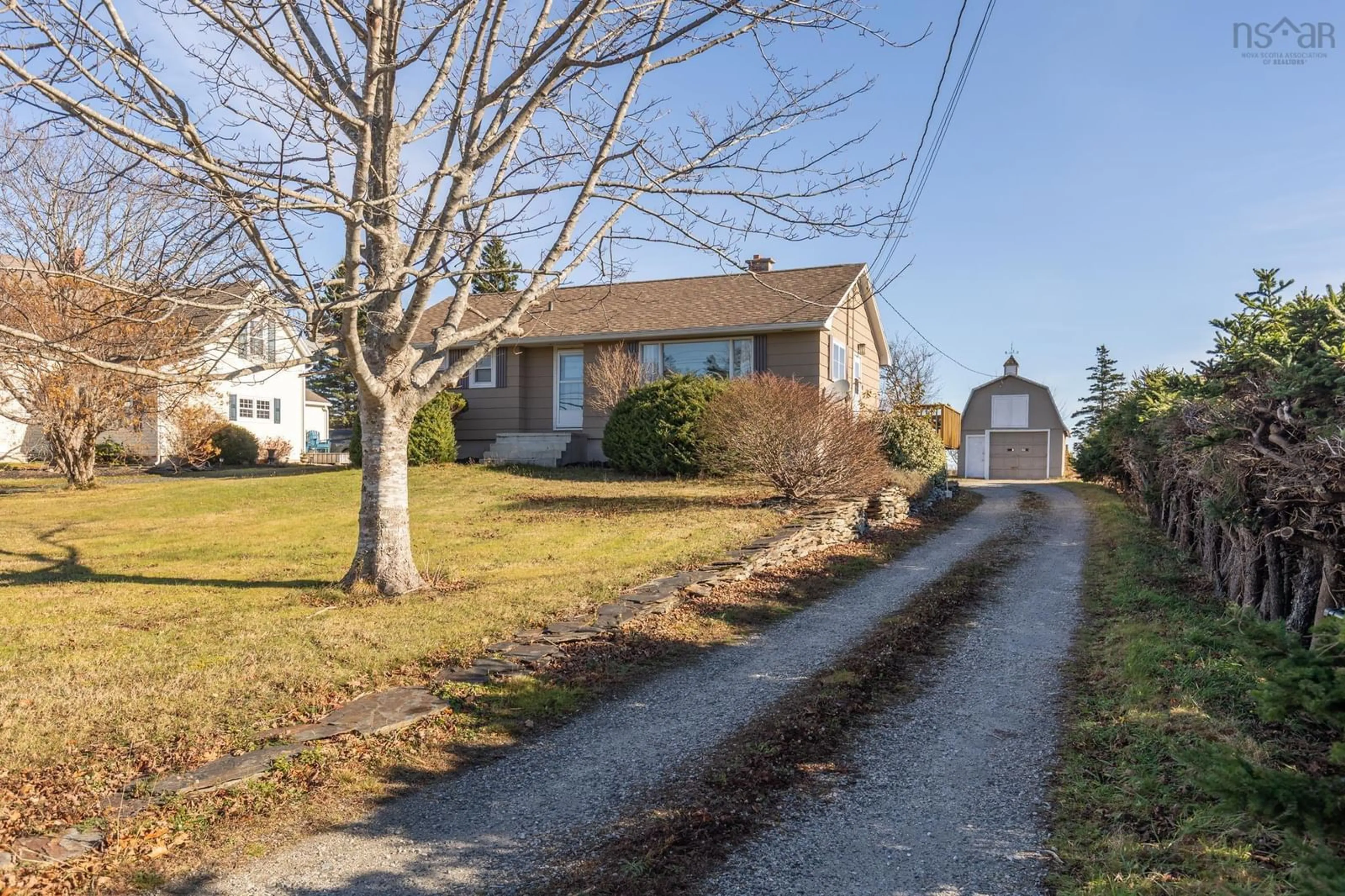 A pic from outside/outdoor area/front of a property/back of a property/a pic from drone, street for 911 Highway 335, West Pubnico Nova Scotia B0W 3S0