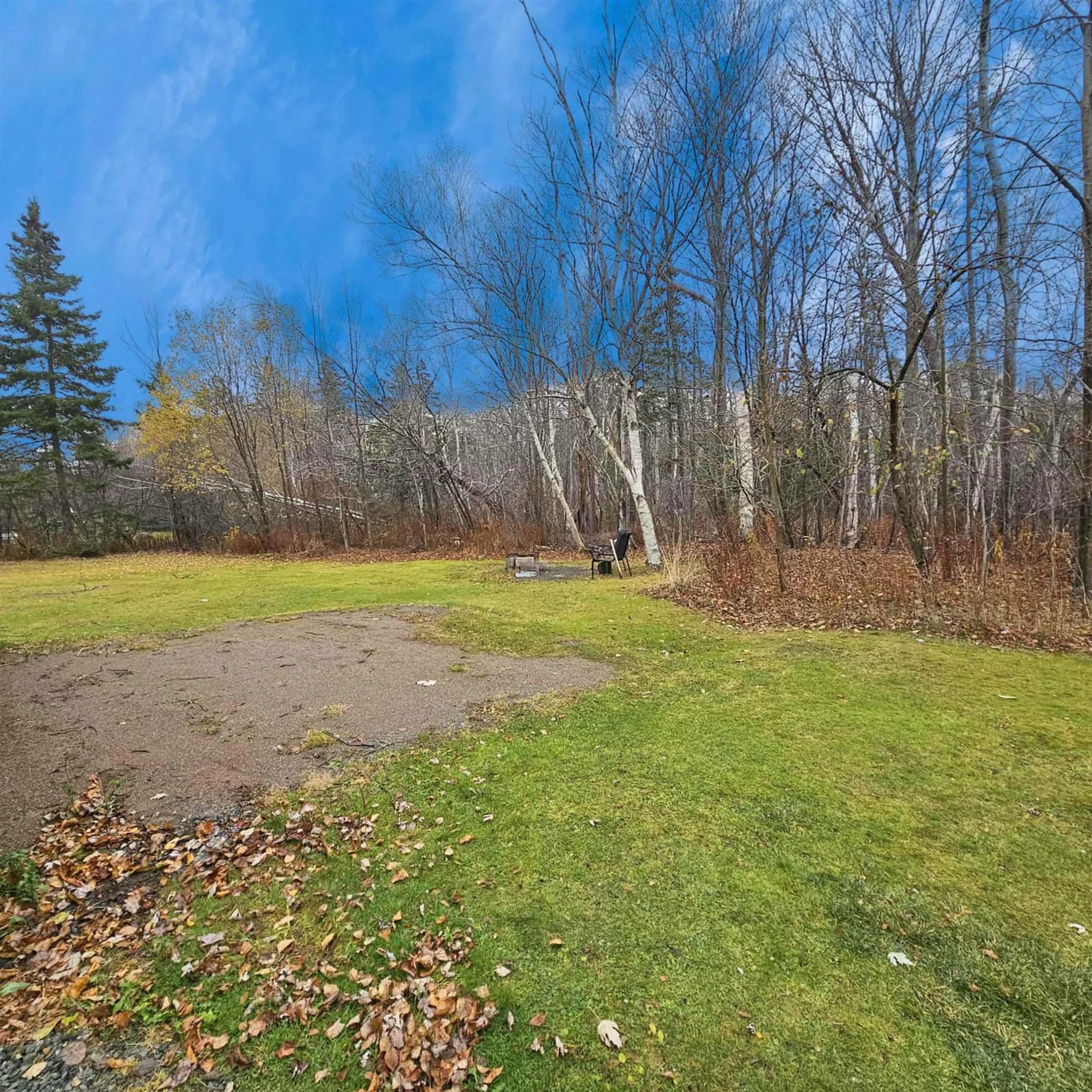 A pic from outside/outdoor area/front of a property/back of a property/a pic from drone, forest/trees view for 73 Fairhaven Dr, Westmount Nova Scotia B1N 1N4