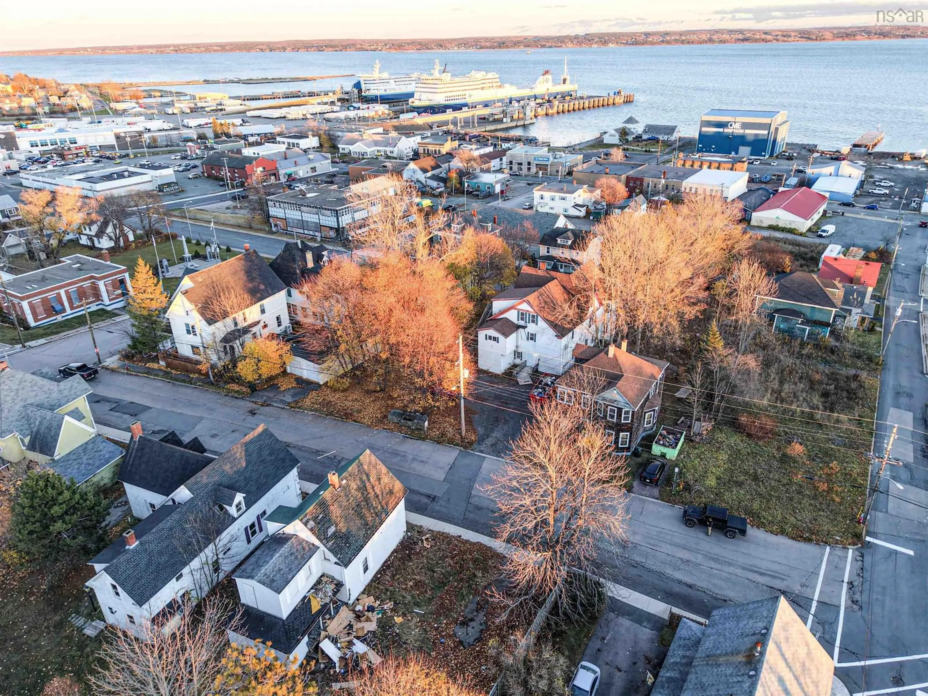 A pic from outside/outdoor area/front of a property/back of a property/a pic from drone, unknown for 72 Pleasant St, North Sydney Nova Scotia B2A 1L5