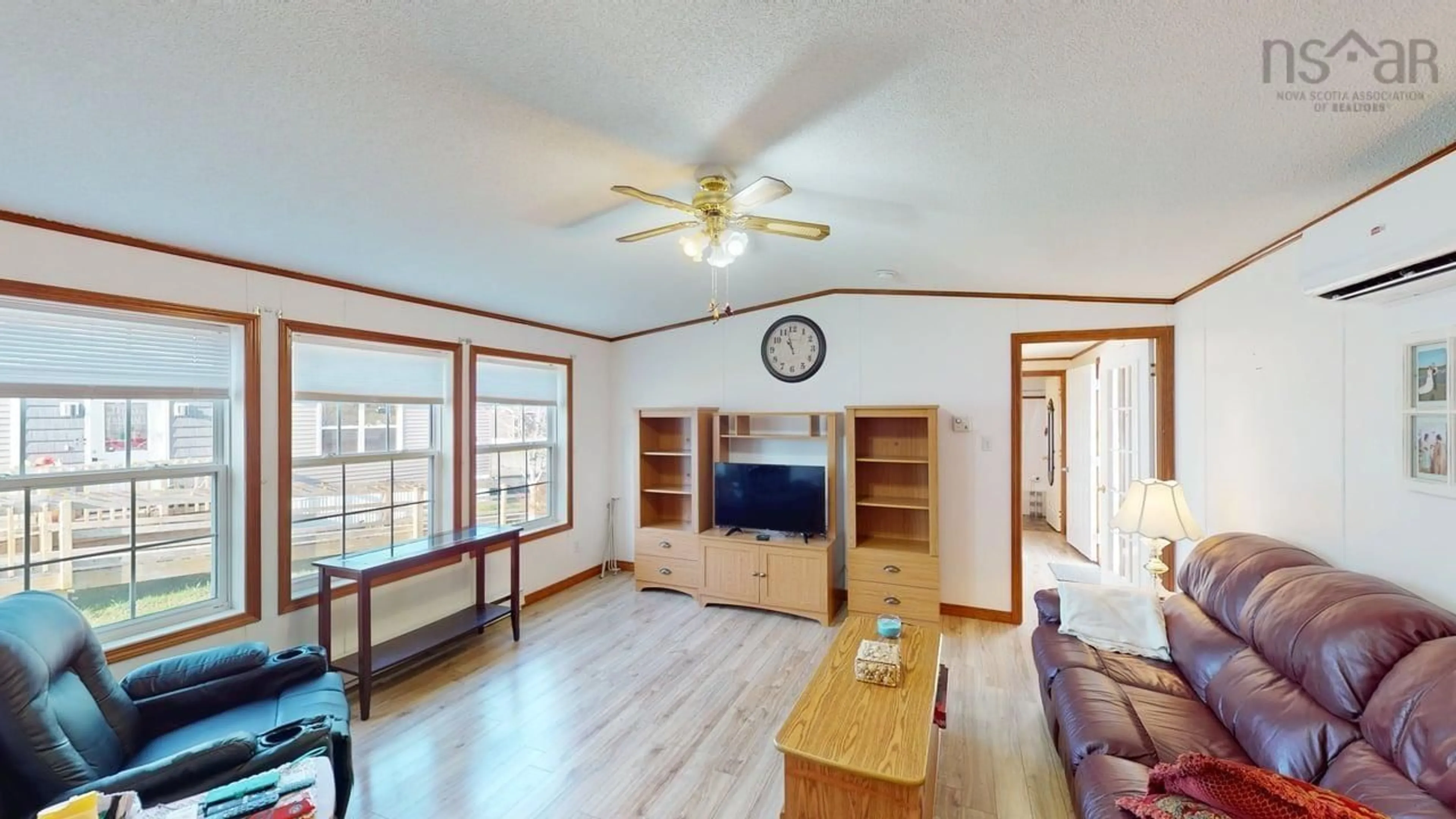 Living room with furniture, wood/laminate floor for 34 Johns Pass, Antigonish Nova Scotia B2G 0E7