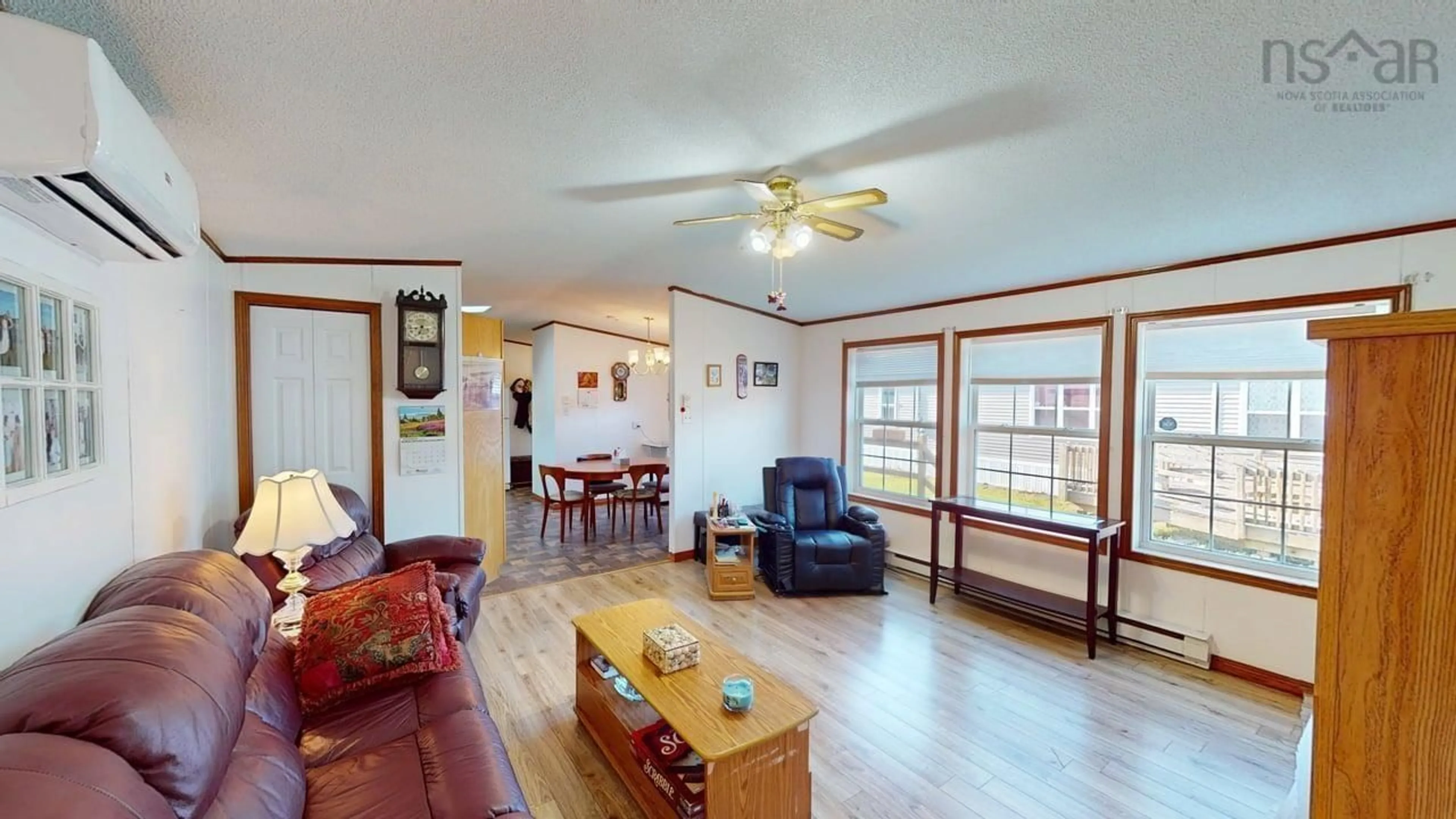 Living room with furniture, wood/laminate floor for 34 Johns Pass, Antigonish Nova Scotia B2G 0E7