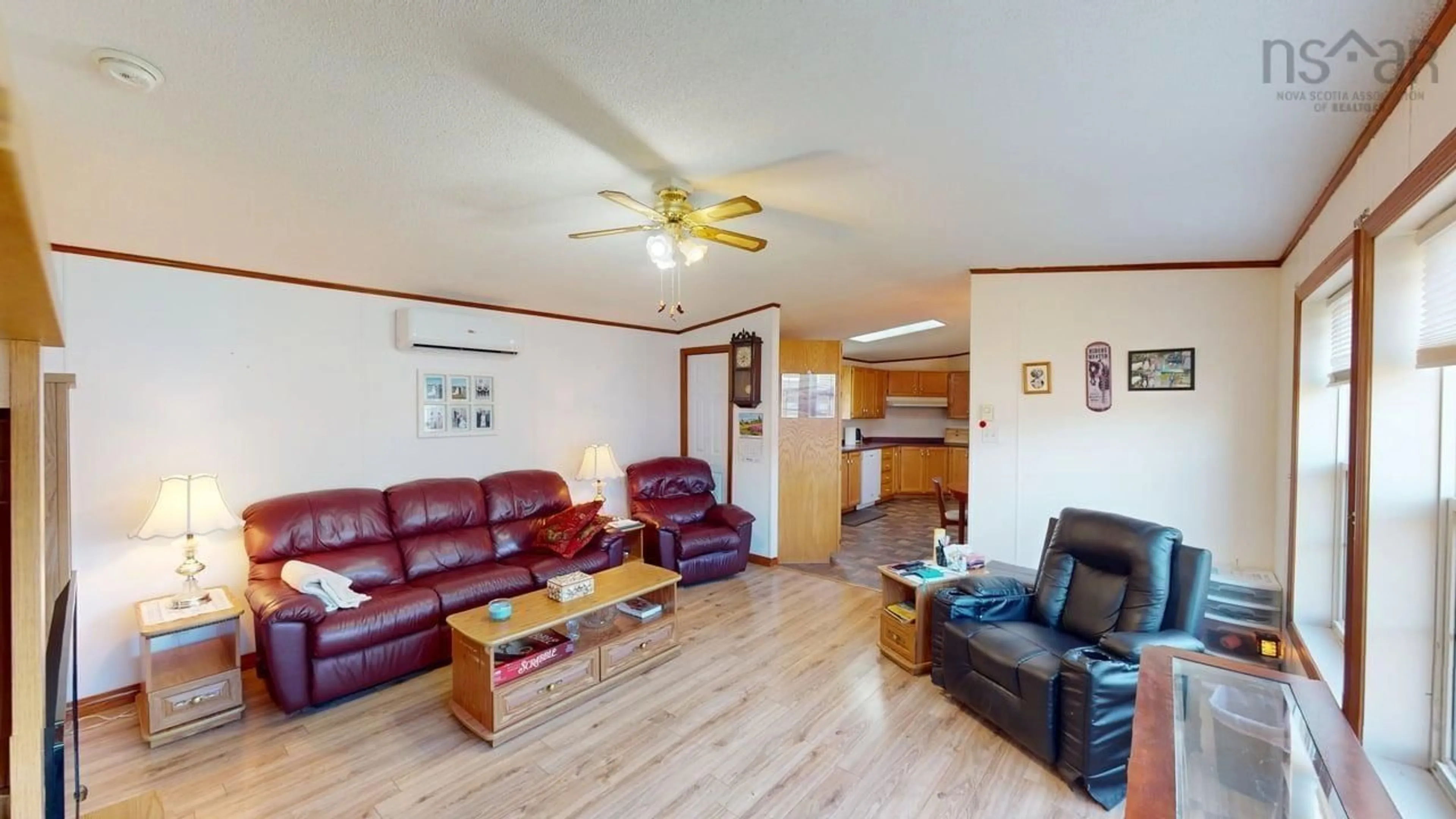 Living room with furniture, wood/laminate floor for 34 Johns Pass, Antigonish Nova Scotia B2G 0E7