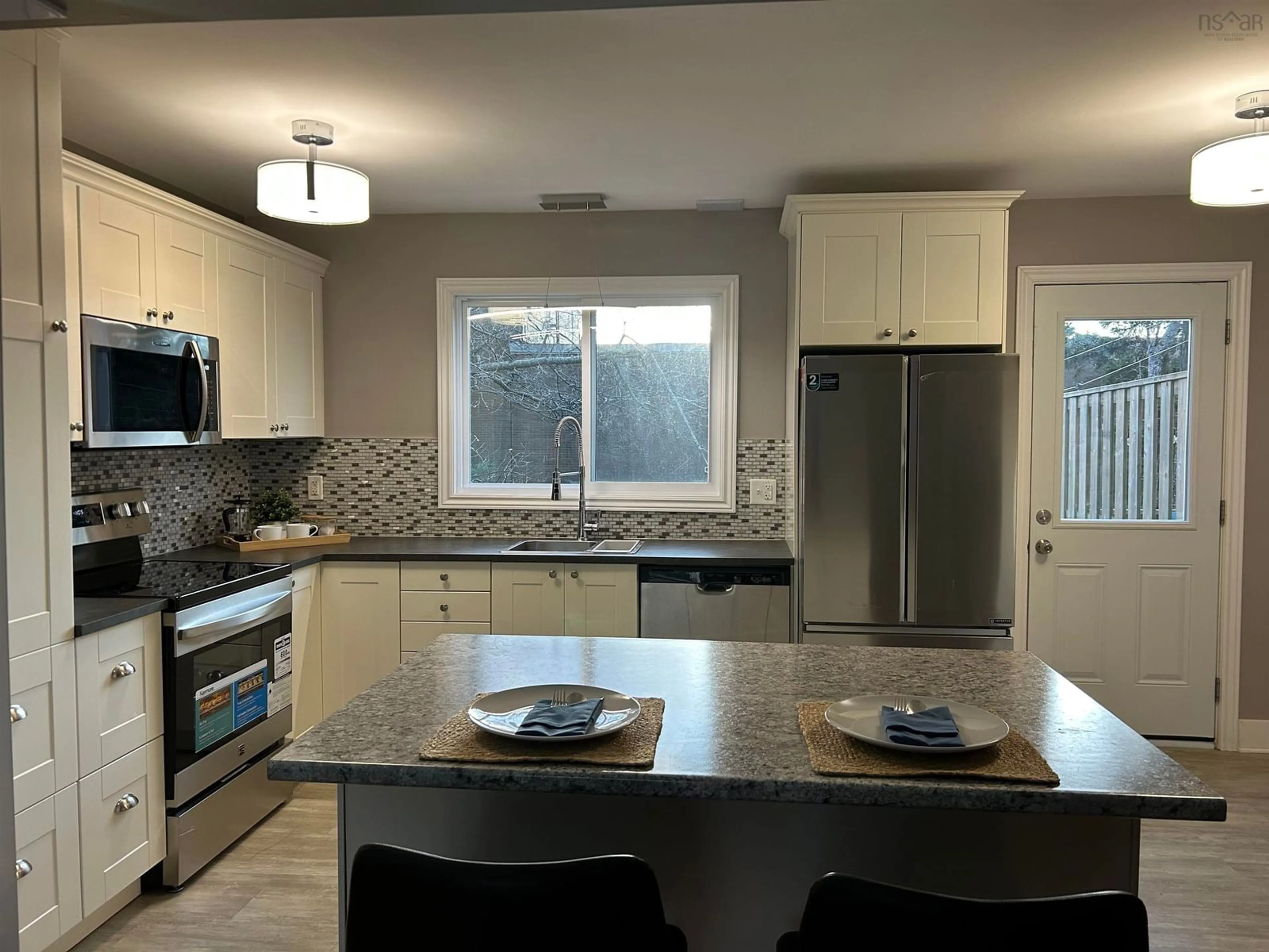 Open concept kitchen, ceramic/tile floor for 12A Brock St, Dartmouth Nova Scotia B2Y 3S9