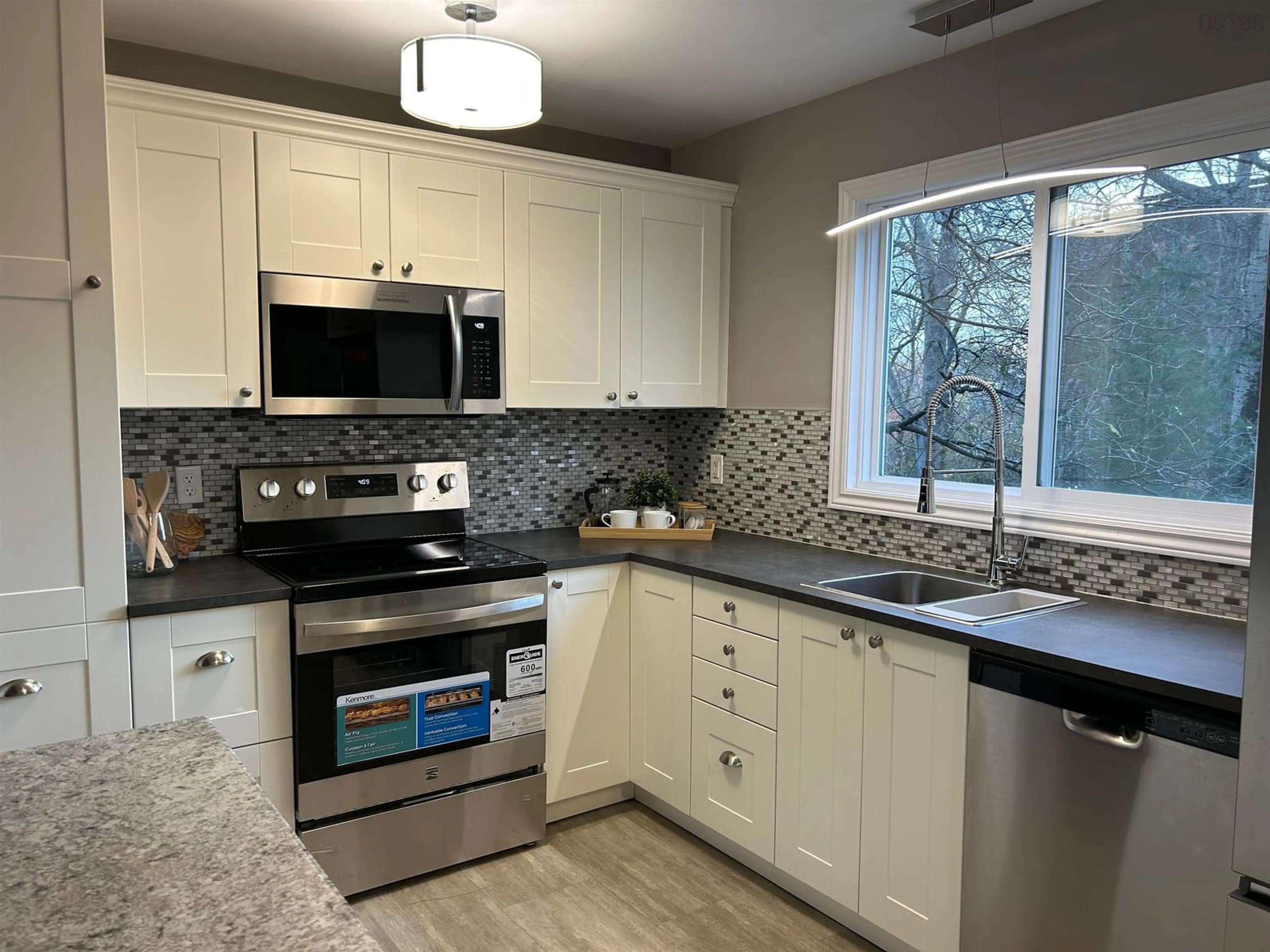 Open concept kitchen, ceramic/tile floor for 12A Brock St, Dartmouth Nova Scotia B2Y 3S9