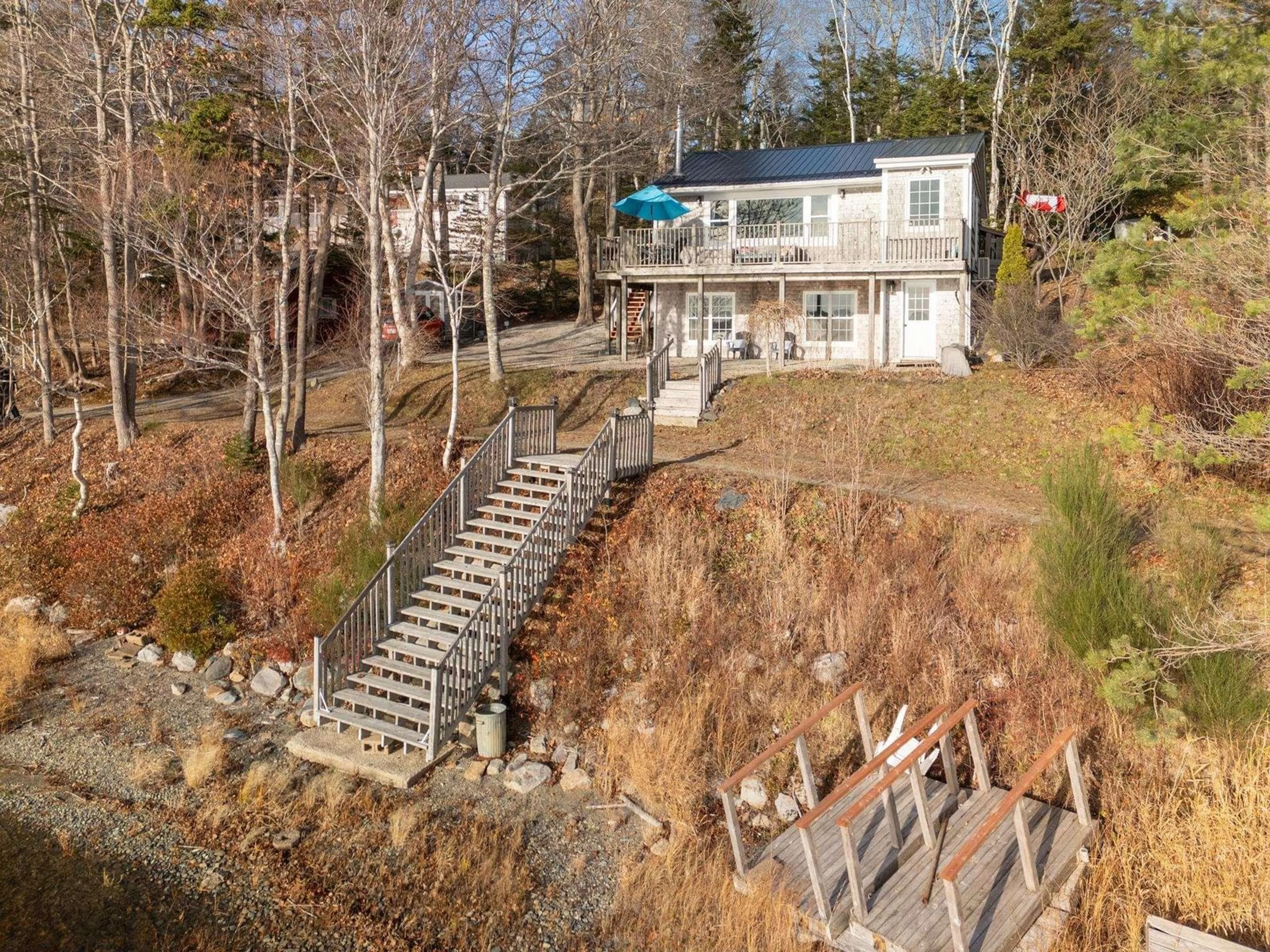 A pic from outside/outdoor area/front of a property/back of a property/a pic from drone, water/lake/river/ocean view for 37 Sumac Lane, Deerfield Nova Scotia B5A 5N7