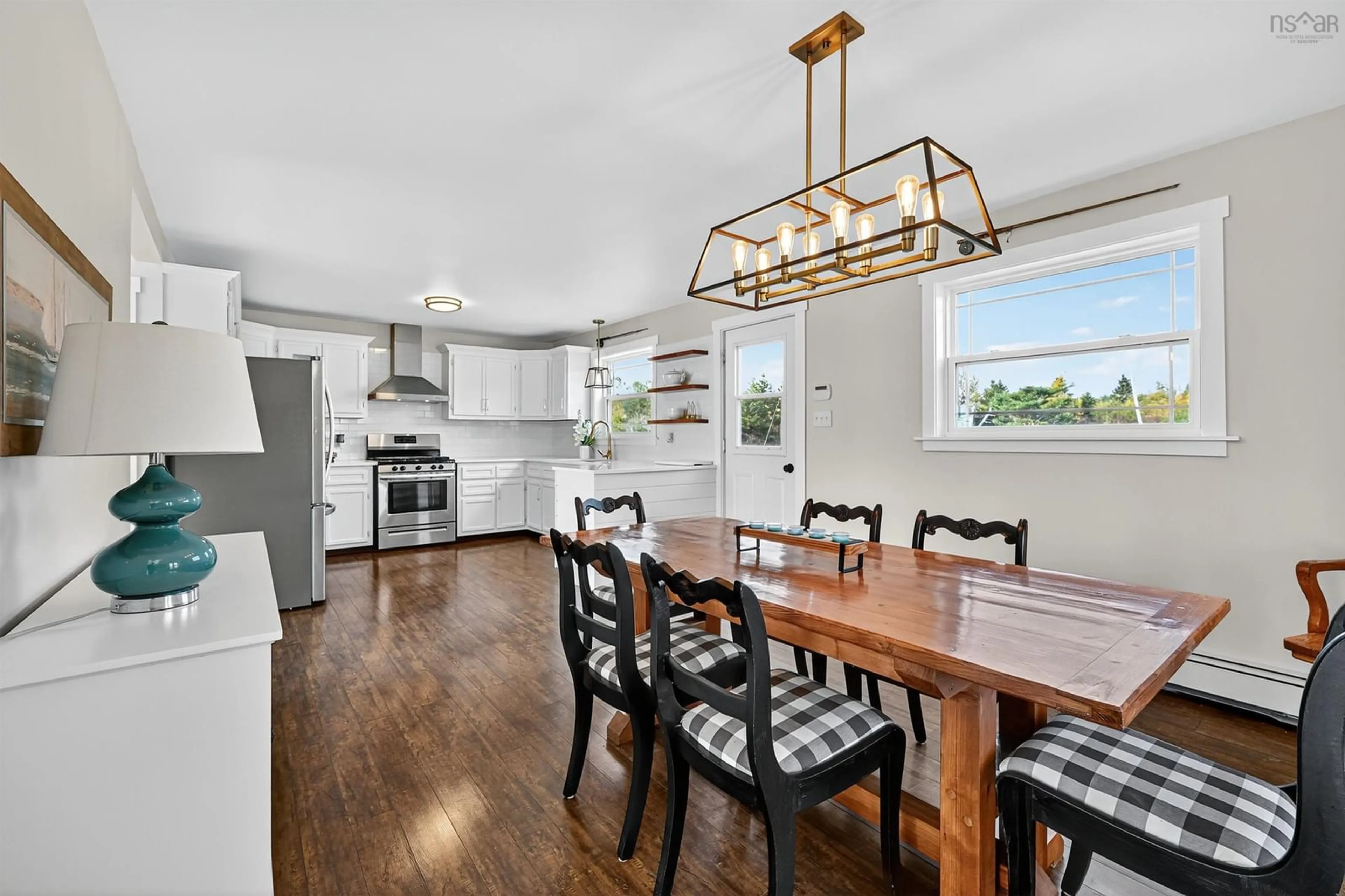 Open concept kitchen, wood/laminate floor for 7715 Gabarus Highway Hwy, Gabarus Nova Scotia B1K 2A7