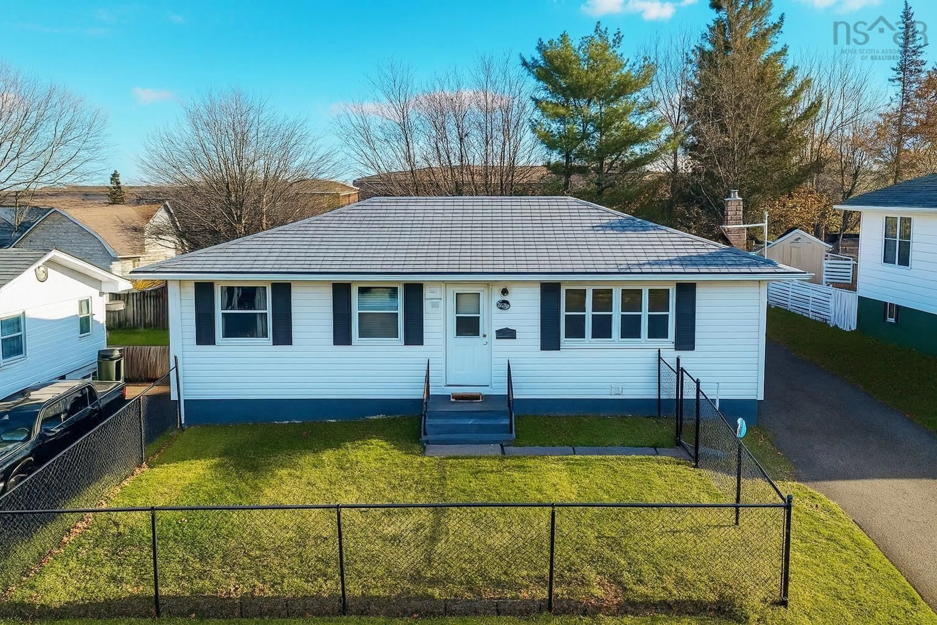 Home with vinyl exterior material, street for 32 Common St, Sydney Nova Scotia B1P 3L1
