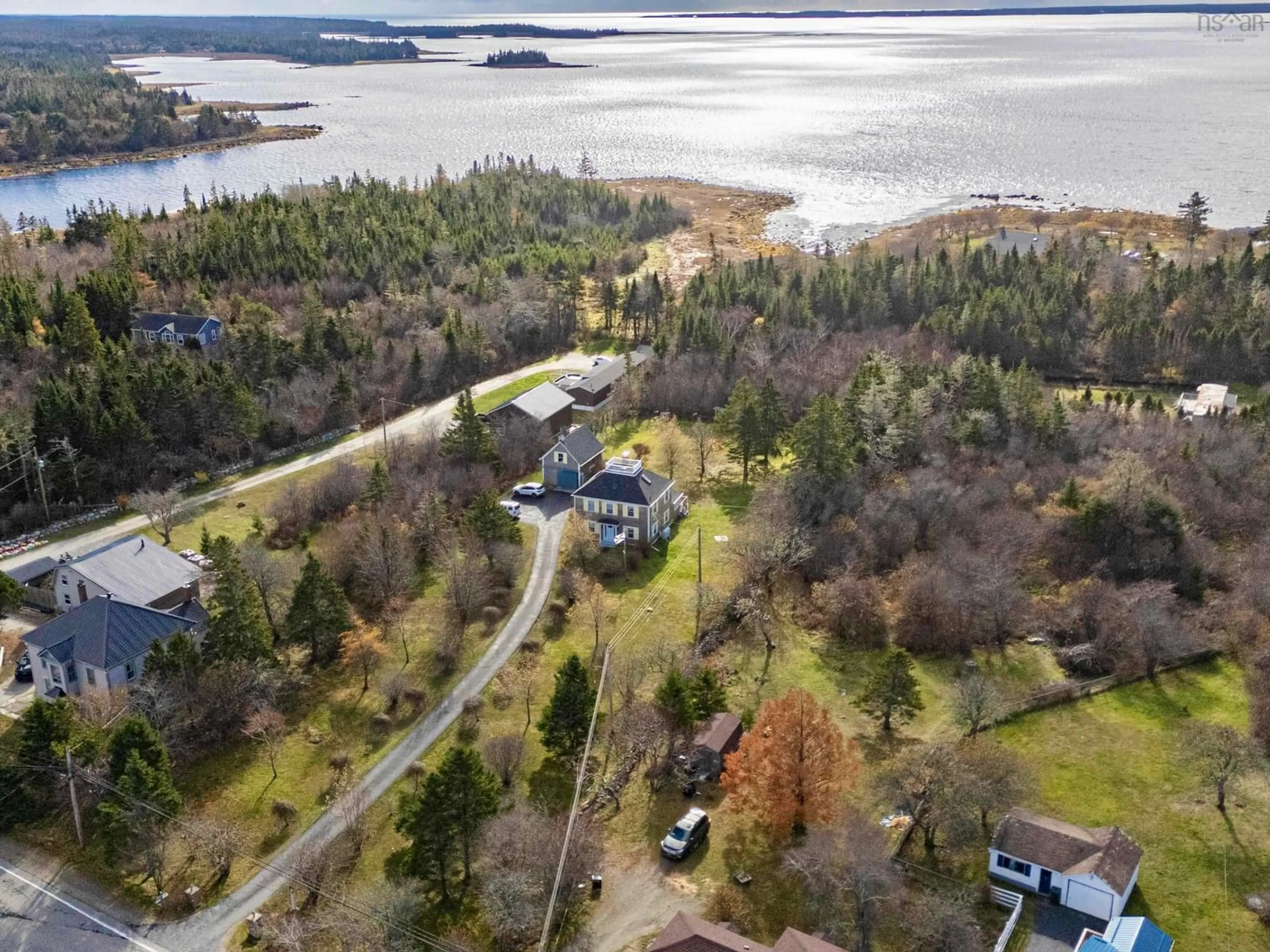 A pic from outside/outdoor area/front of a property/back of a property/a pic from drone, water/lake/river/ocean view for 2133 Highway 3, Barrington Nova Scotia B0W 1E0