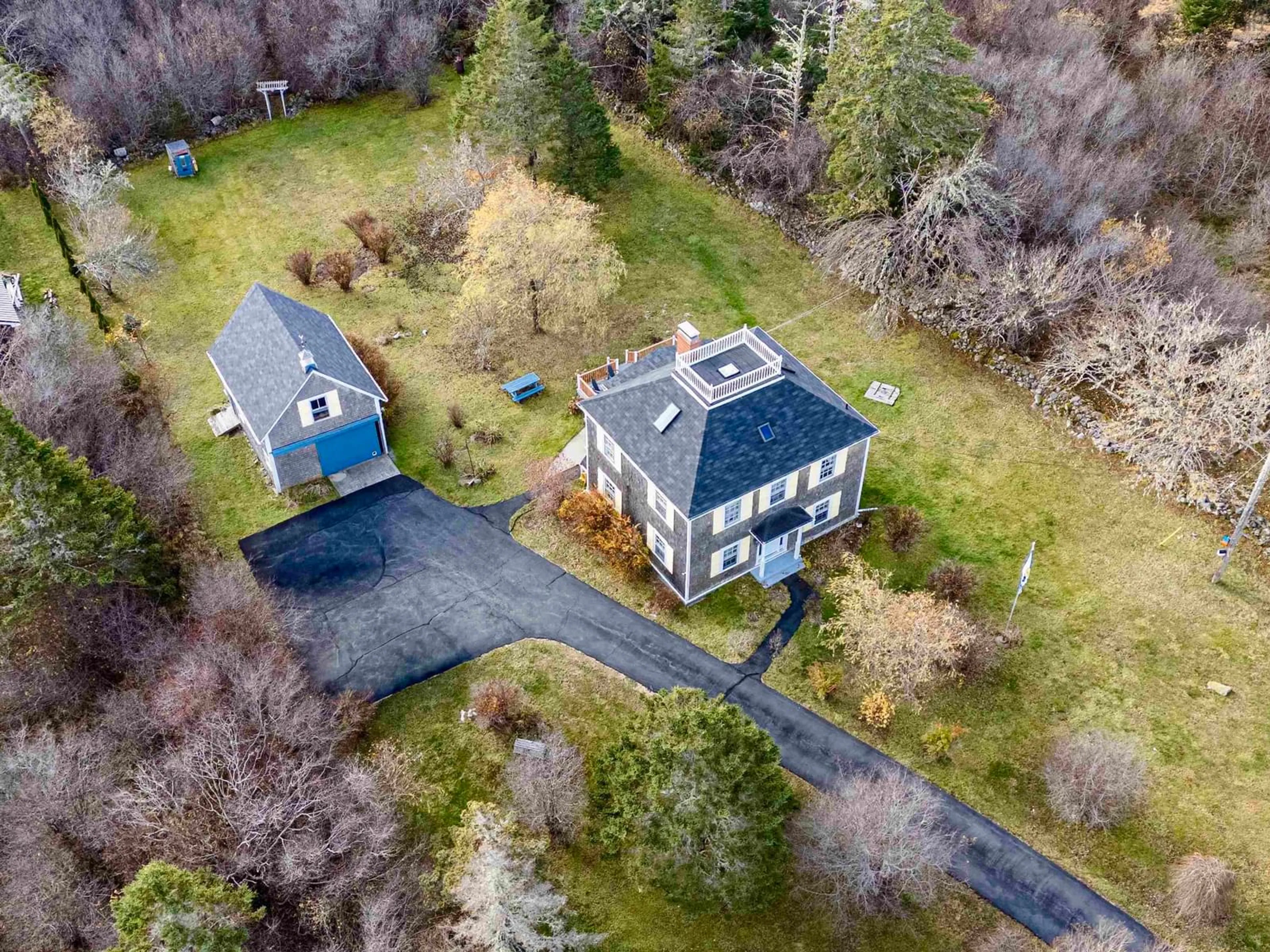 A pic from outside/outdoor area/front of a property/back of a property/a pic from drone, street for 2133 Highway 3, Barrington Nova Scotia B0W 1E0