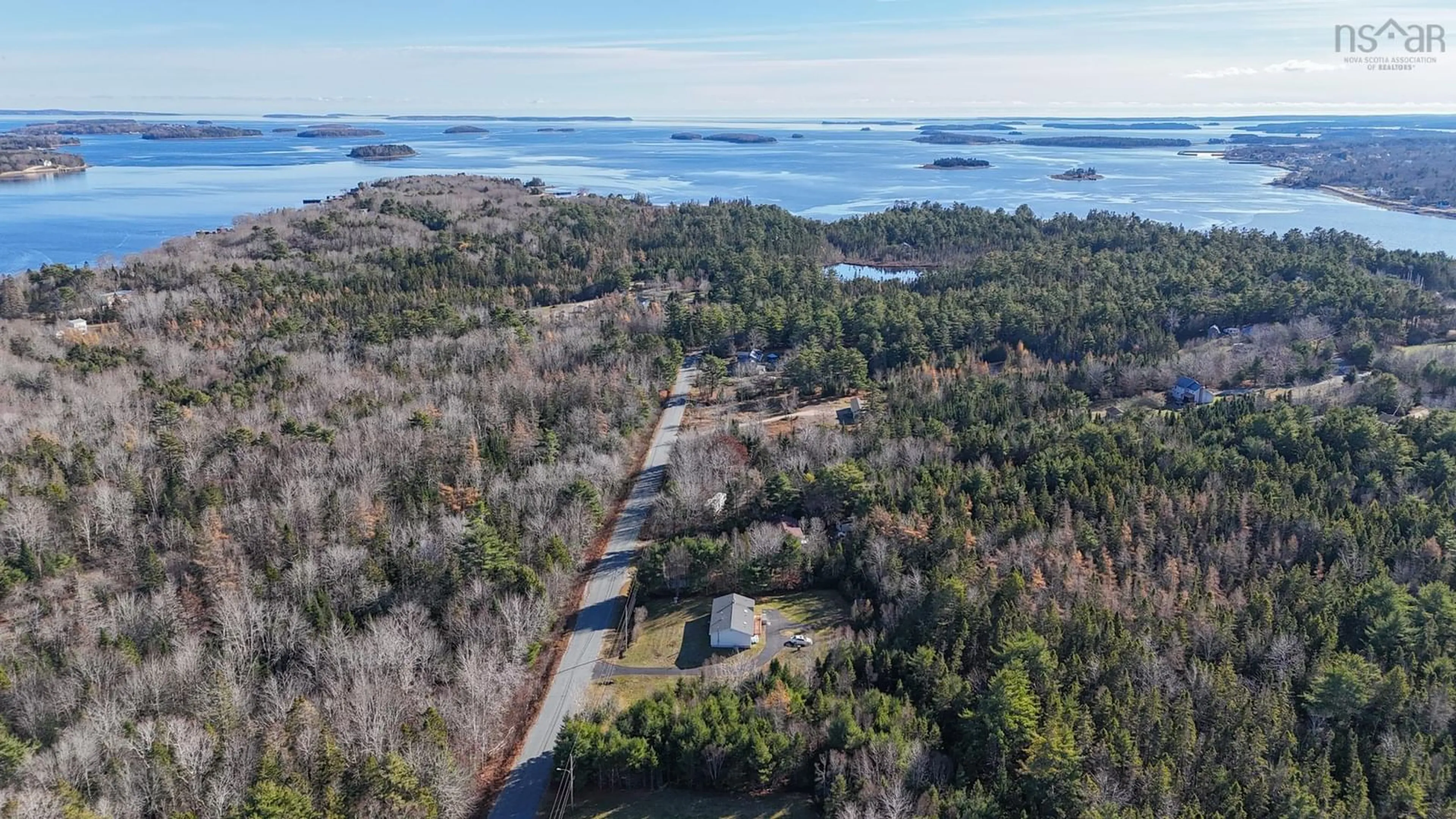 A pic from outside/outdoor area/front of a property/back of a property/a pic from drone, water/lake/river/ocean view for 627 Borgalds Point Rd, Chester Basin Nova Scotia B0J 1K0