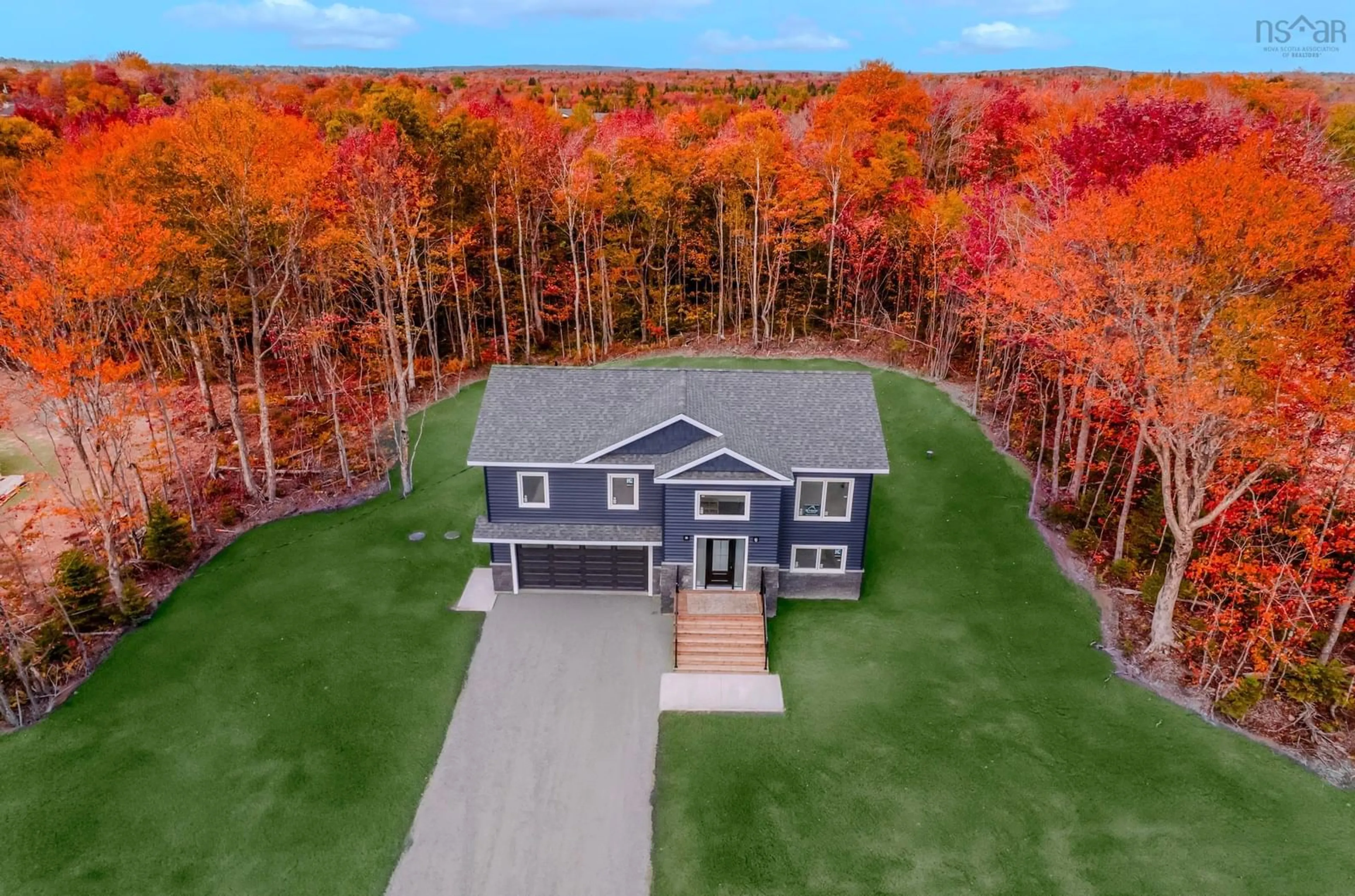 A pic from outside/outdoor area/front of a property/back of a property/a pic from drone, unknown for 43 Emerson Dr, Howie Centre Nova Scotia B1L 1H1