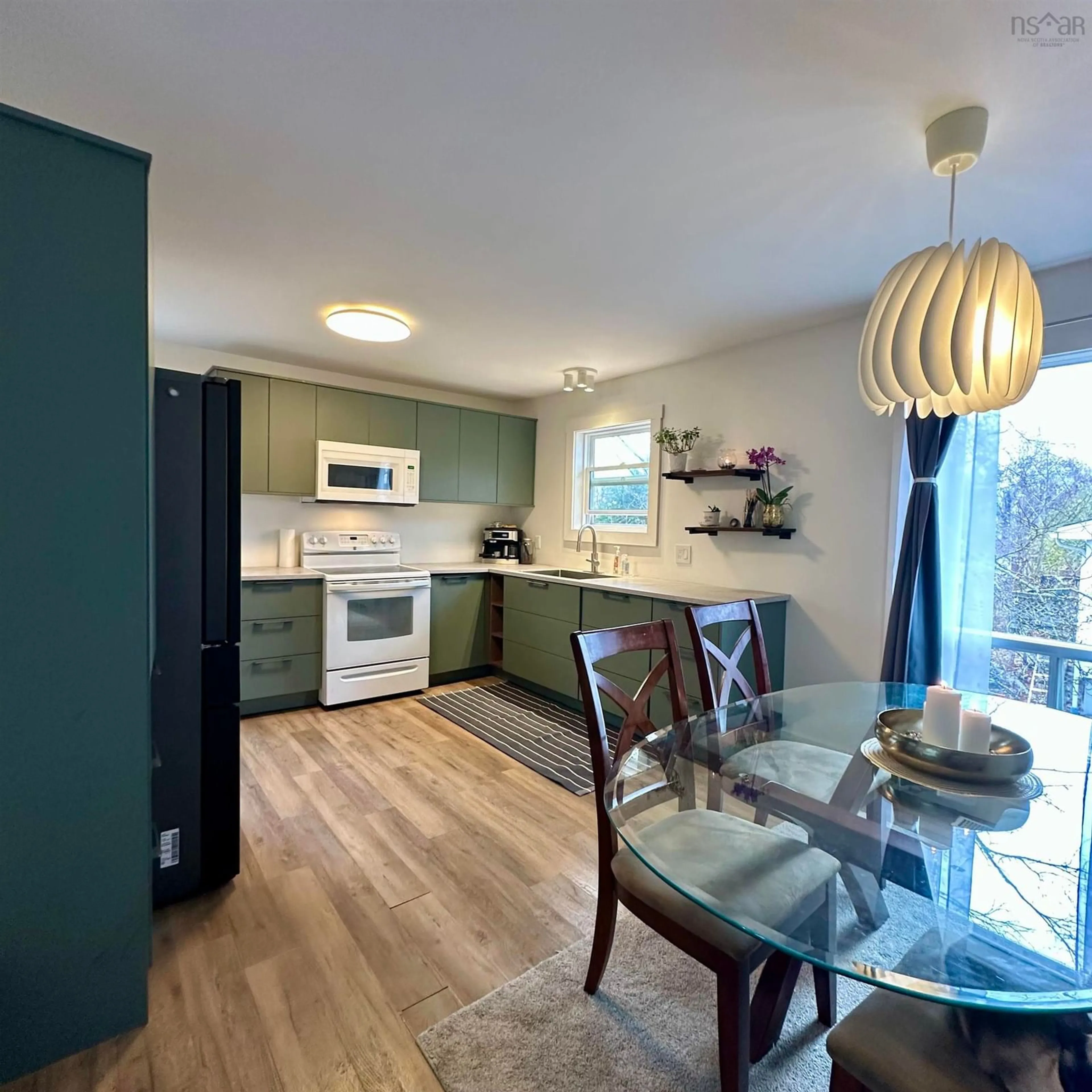 Open concept kitchen, wood/laminate floor for 315 Kydd St, Bridgewater Nova Scotia B4V 3G8