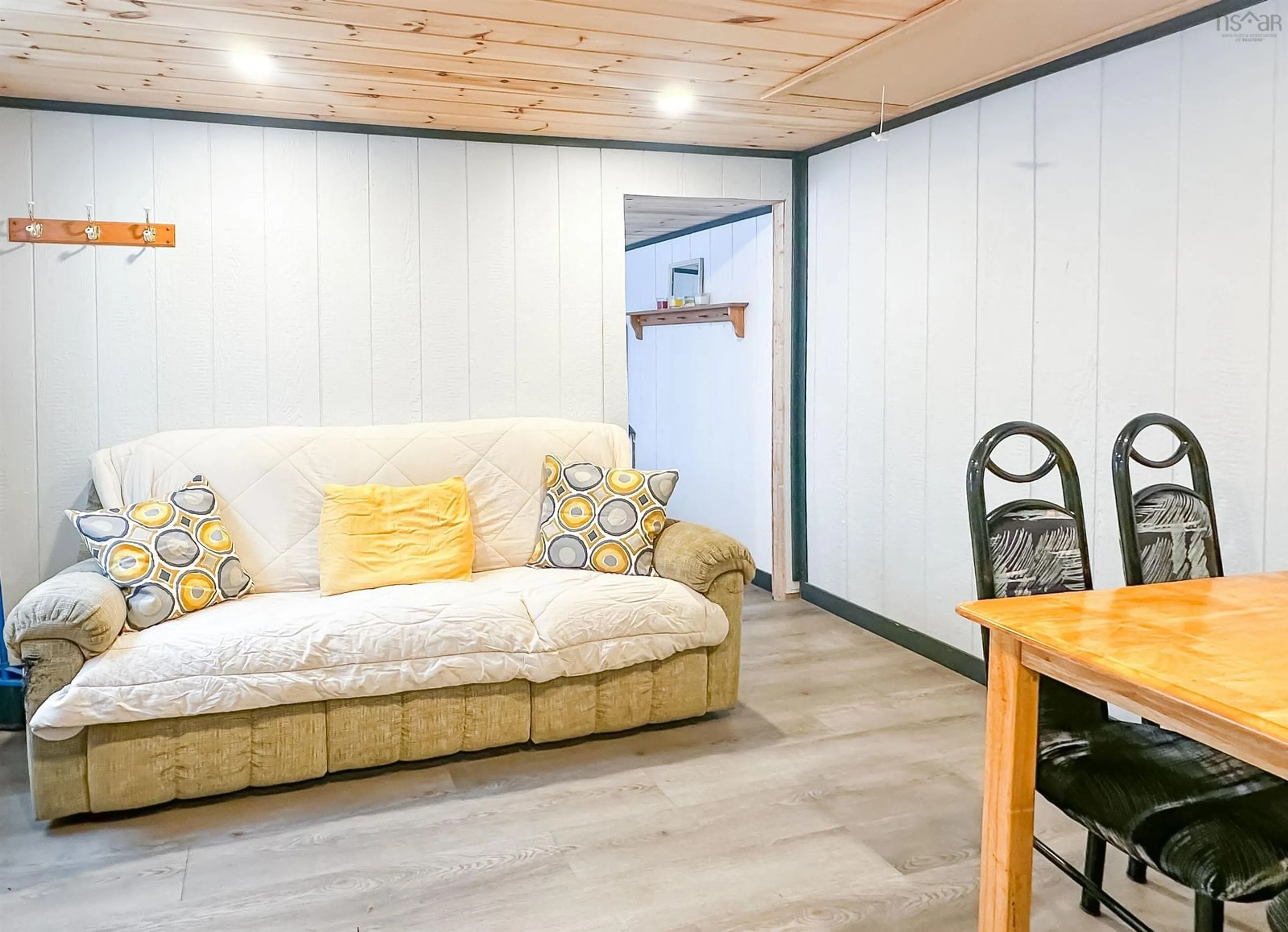 Living room with furniture, wood/laminate floor for Pioneer Dr #136, Vaughan Nova Scotia B0N 2T0