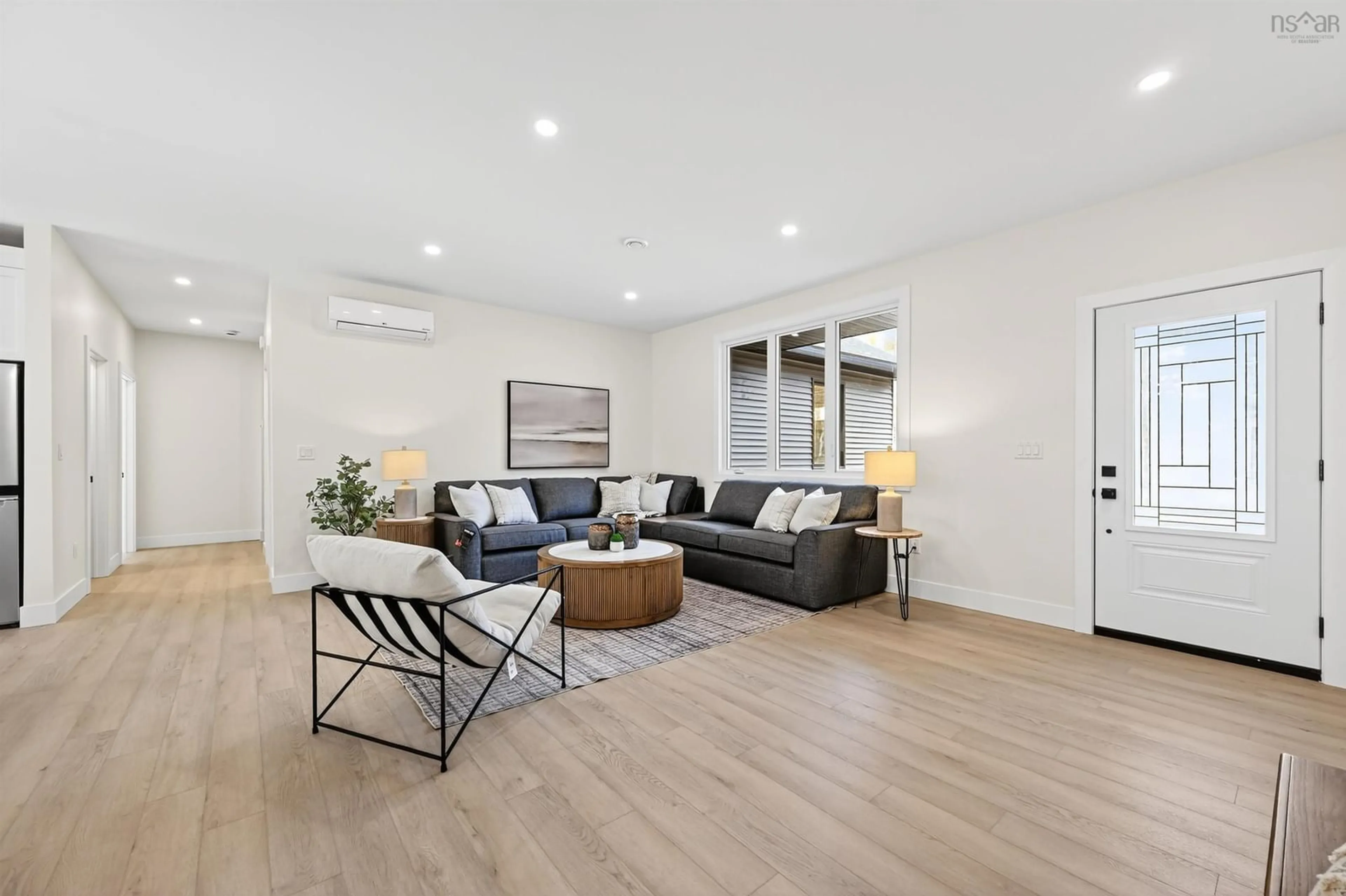 Living room with furniture, wood/laminate floor for 14 Emerson Drive, Howie Centre Nova Scotia B1L 1H1