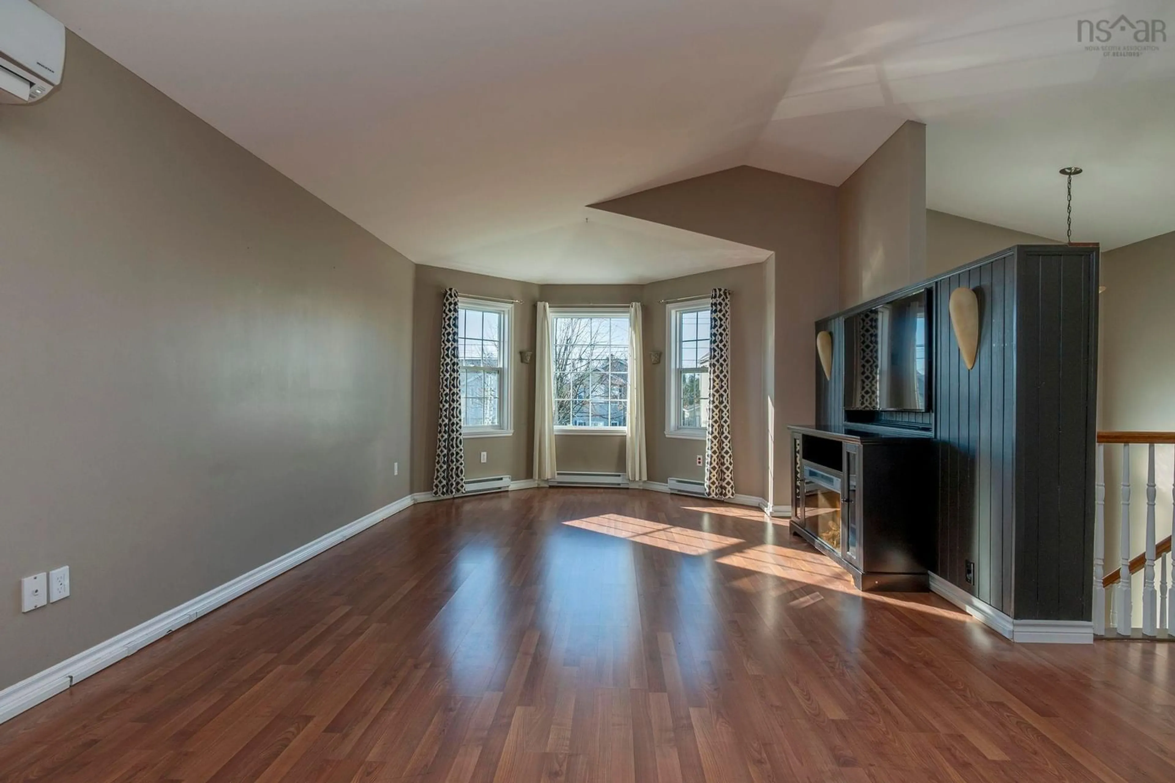 Living room with furniture, wood/laminate floor for 112 Heritage Hills Dr, Eastern Passage Nova Scotia B3G 1T4