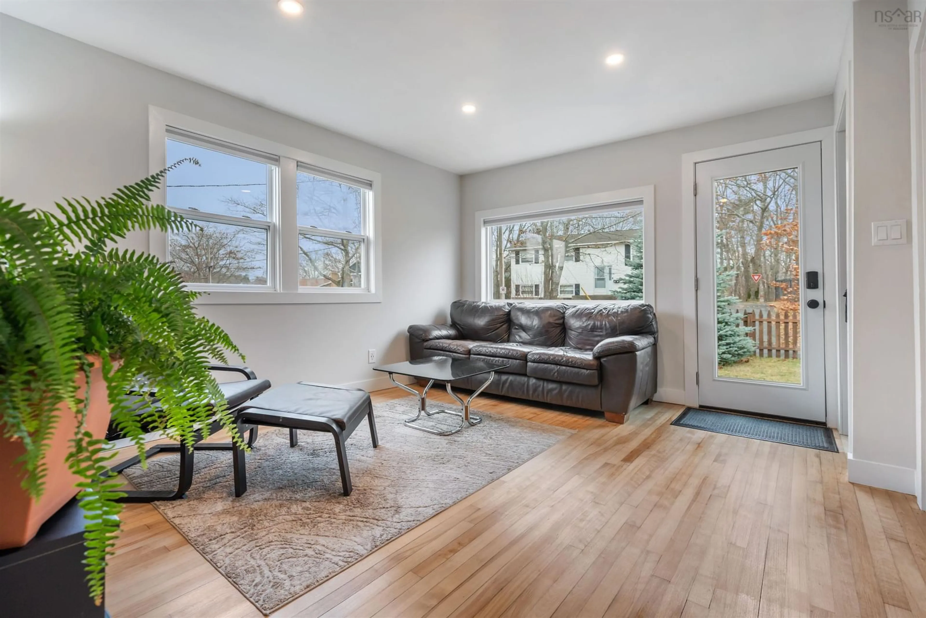 Living room with furniture, wood/laminate floor for 23 Levis St, Halifax Nova Scotia B3R 1M1