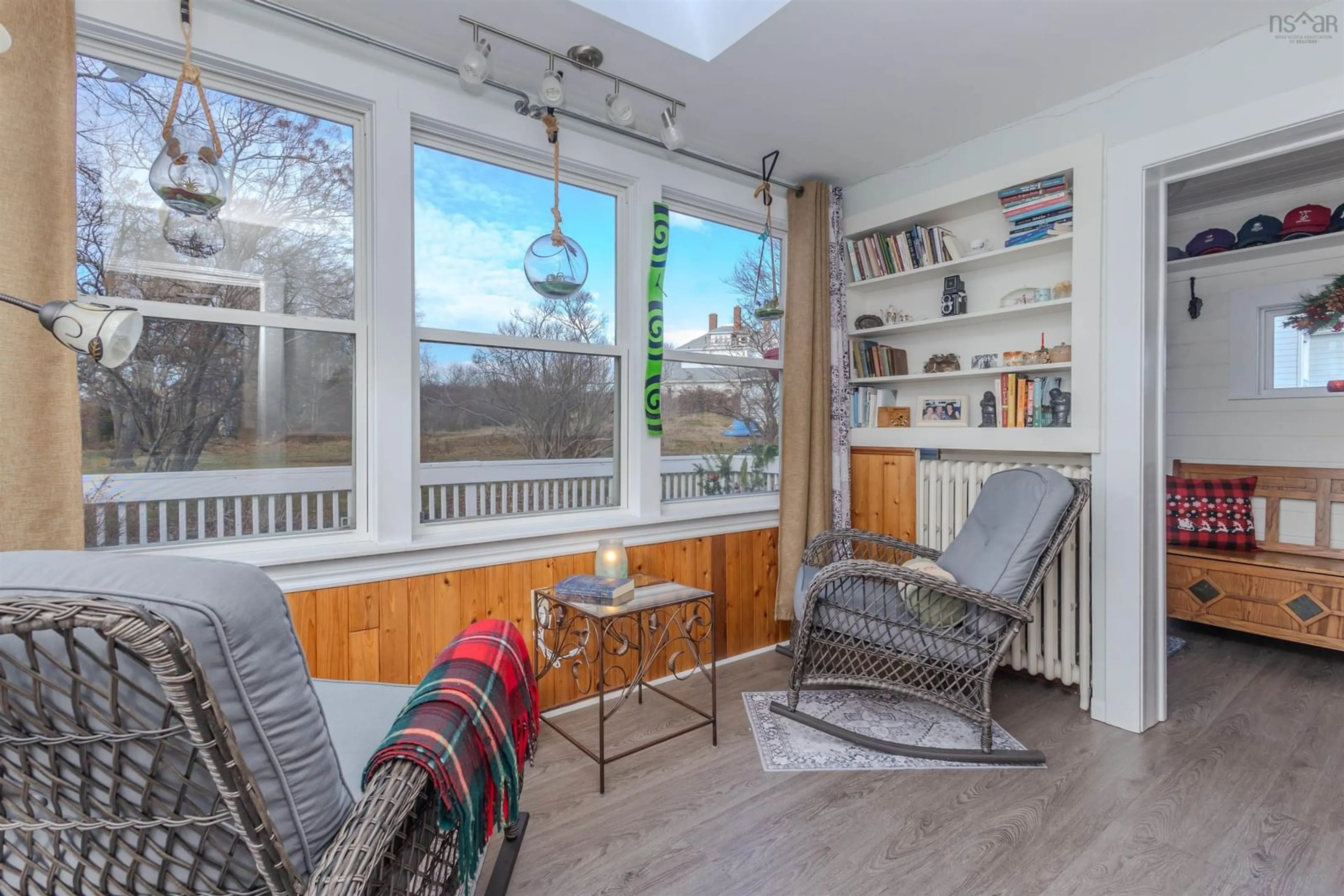 Living room with furniture, wood/laminate floor for 340 King Edward St, Glace Bay Nova Scotia B1A 3W3